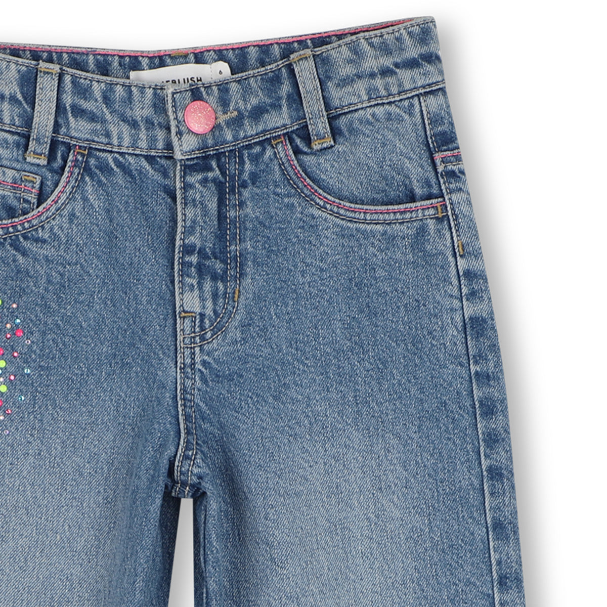 Close-up of Billieblush blue denim jeans with pink button and stitching