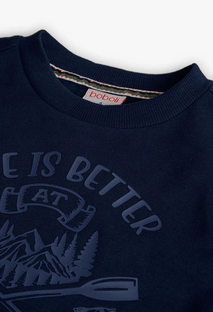 Close-up of slogan and oar motif print on the front of Boboli Boys navy fleece sweatshirt.