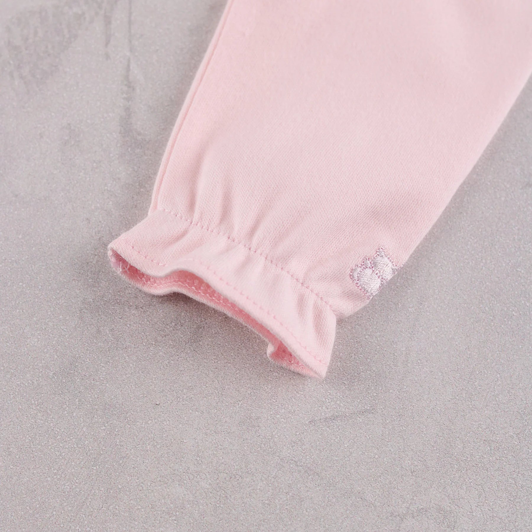 Emile et Rose Madeleine baby girls pink babygrow sleeve embroidery detail