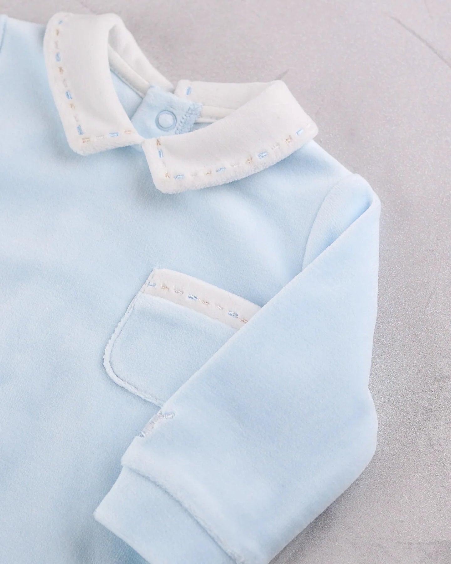 Close-up of Emile et Rose Mason embroidered collar and pocket detail