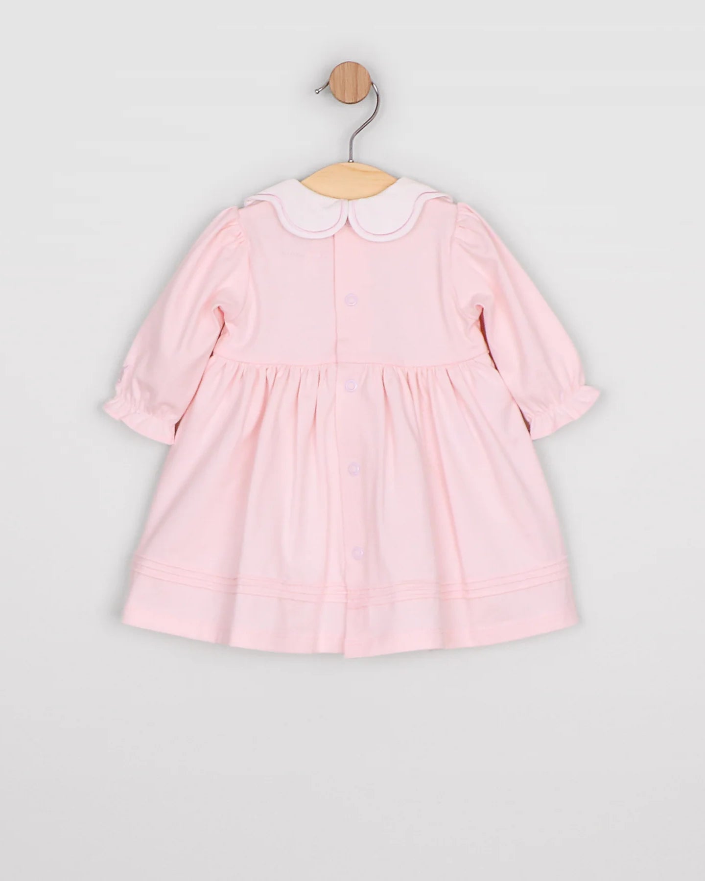 Back view of the Emile et Rose Maggie pale pink baby occasion dress