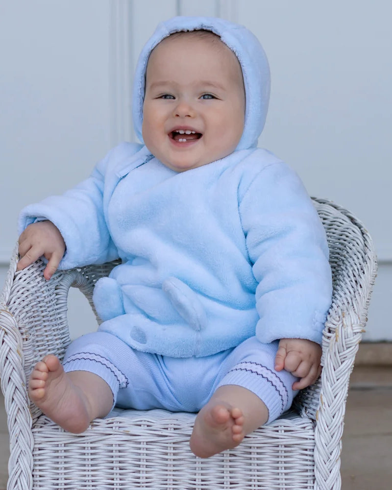 Baby wearing the Emile et Rose Axel pale blue fleece jacket