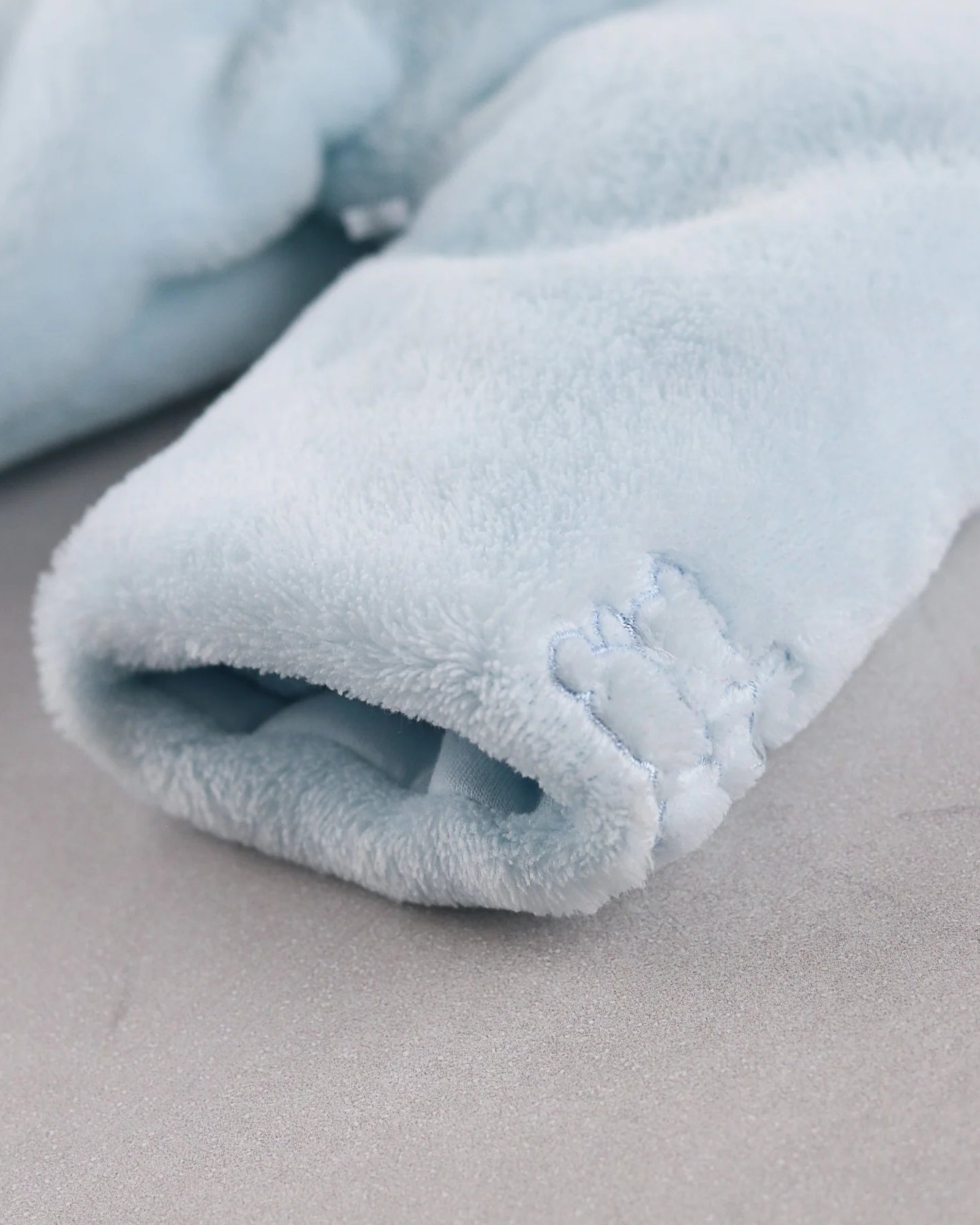 Close-up of the hidden elasticated cuff on the Emile et Rose Axel jacket