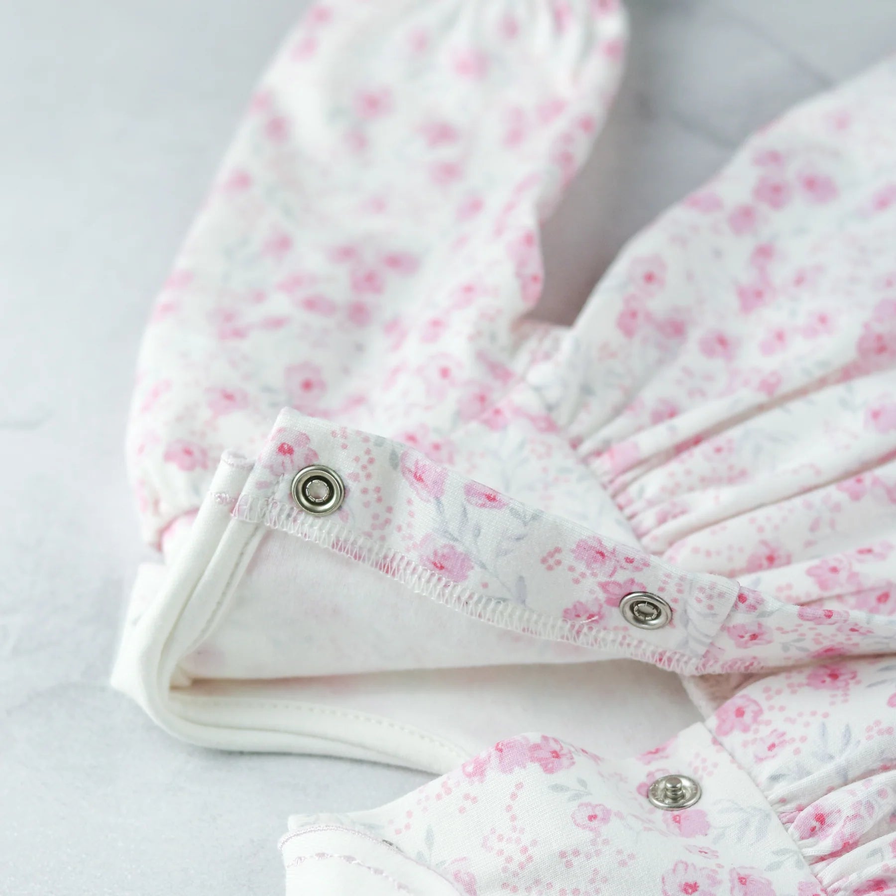 Emile et Rose Katya baby girls floral jersey dress popper opening detail