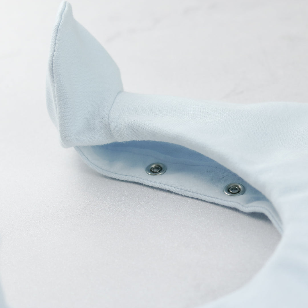 Emile et Rose baby boys blue babygrow close up poppers on the closed feet