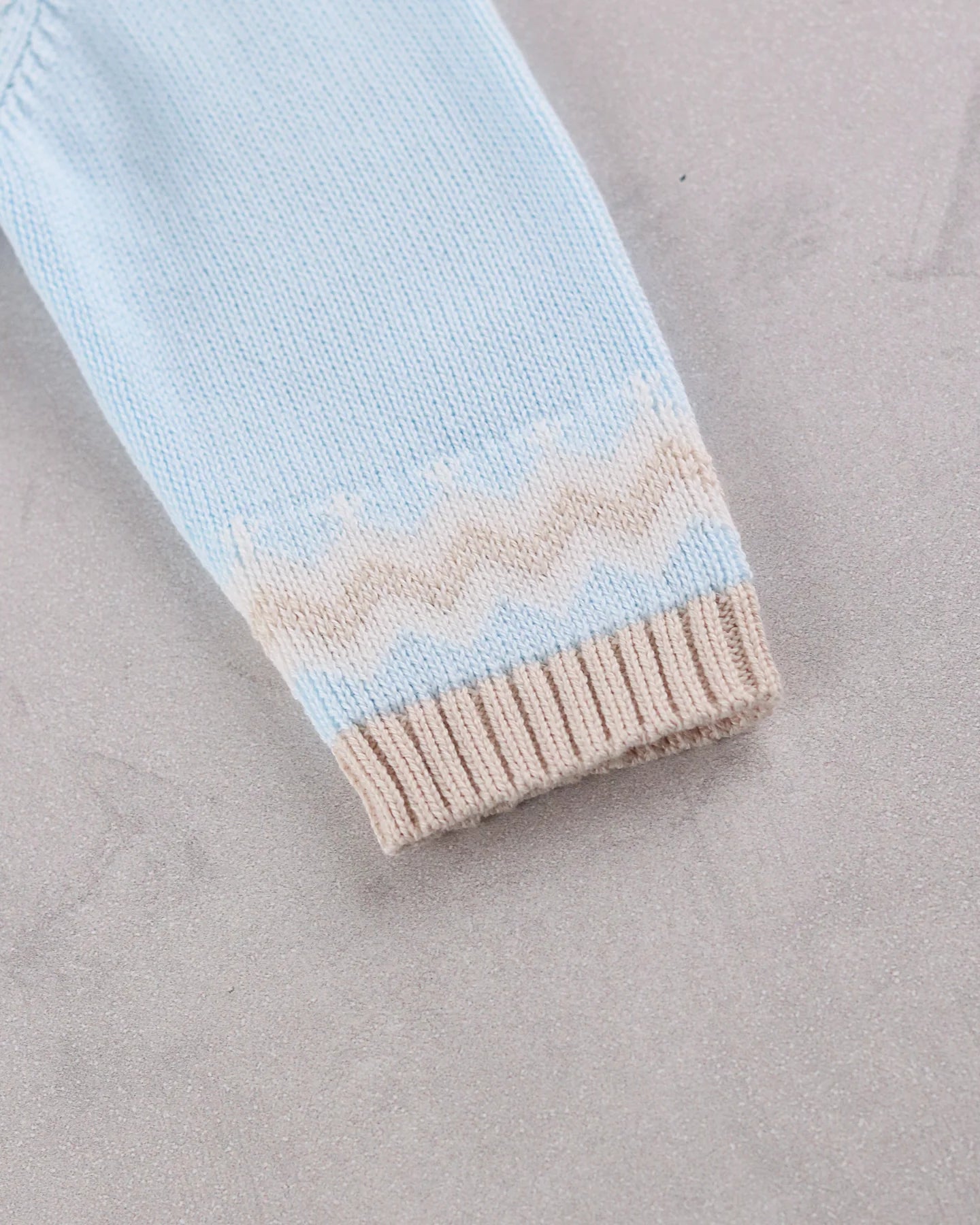 Close-up of Emile et Rose Martin knitted cuff detail