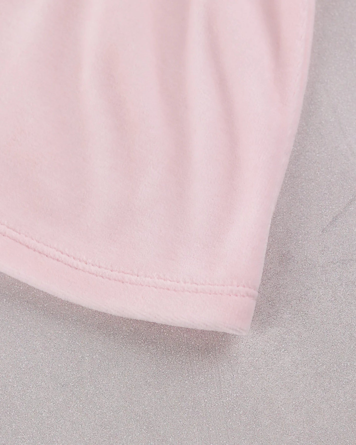 Close-up of the soft pale pink velour fabric on the Emile et Rose Michelle baby girls outfit set