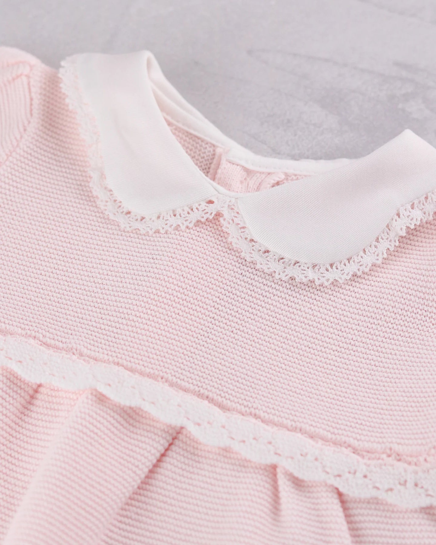 Close-up of the knitted detail and oversized collar on the Emile et Rose Millie dress