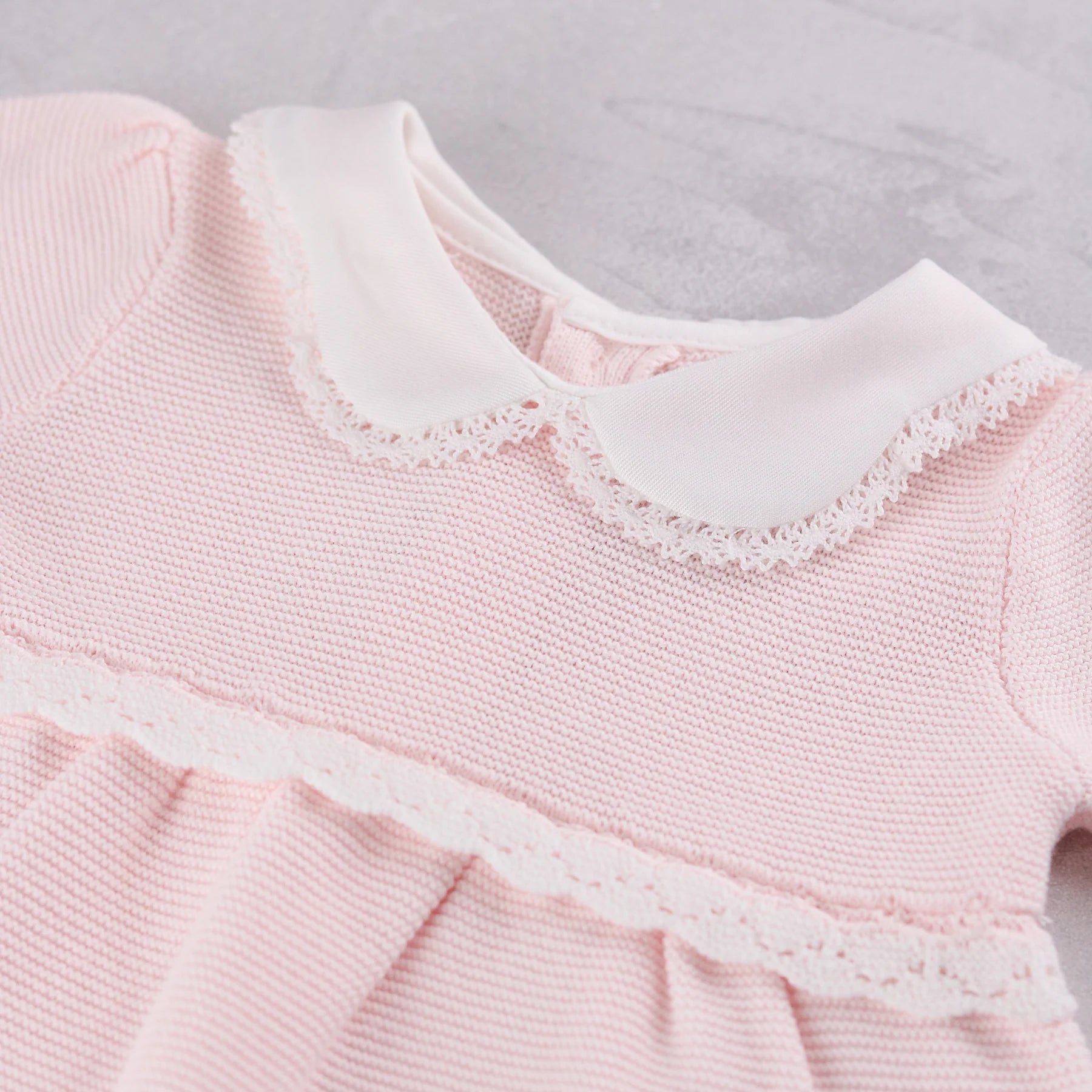 Close-up of the knitted detail and oversized collar on the Emile et Rose Millie dress