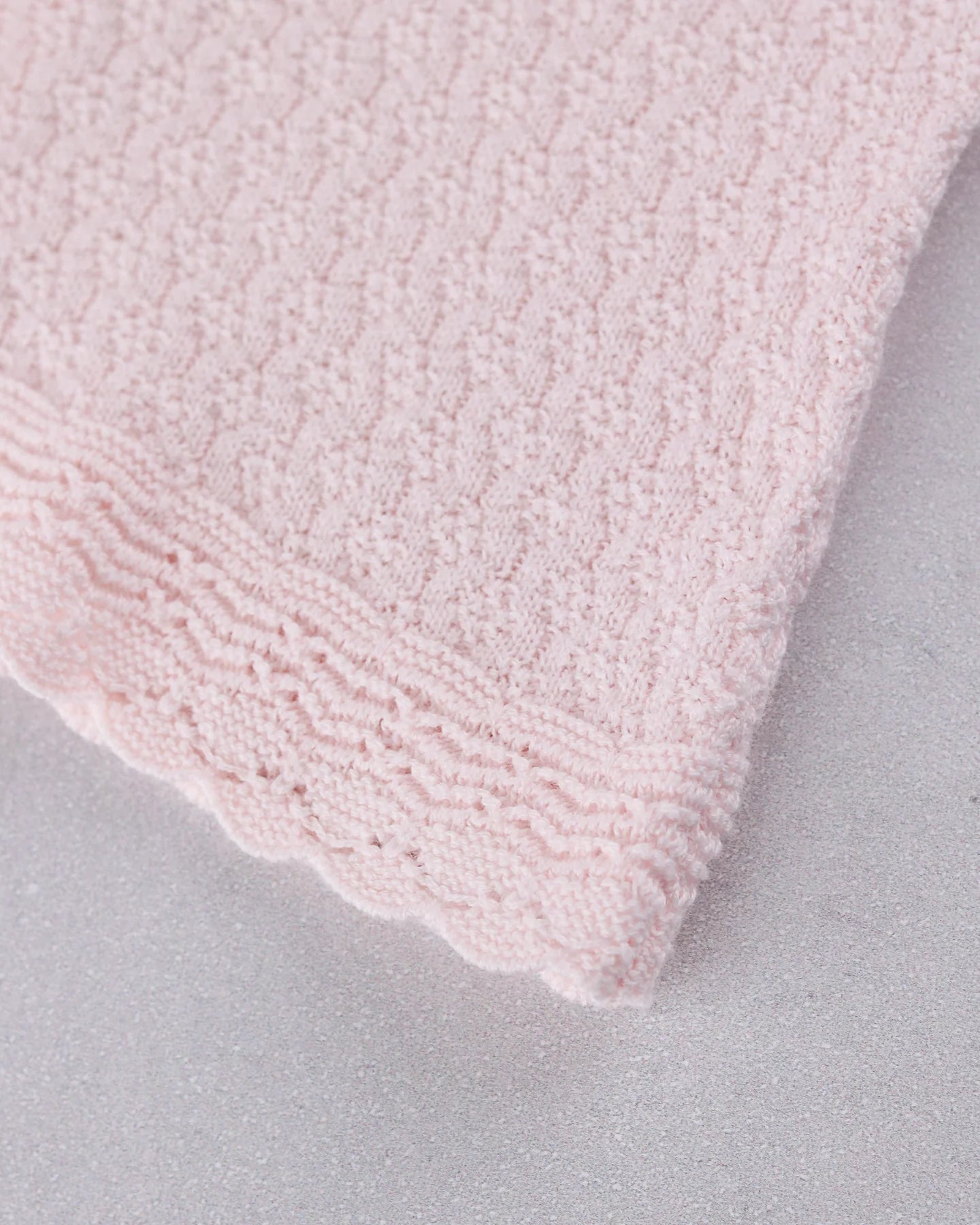 Close-up of the knitted cuff detail on the Emile et Rose Minny baby girls outfit set
