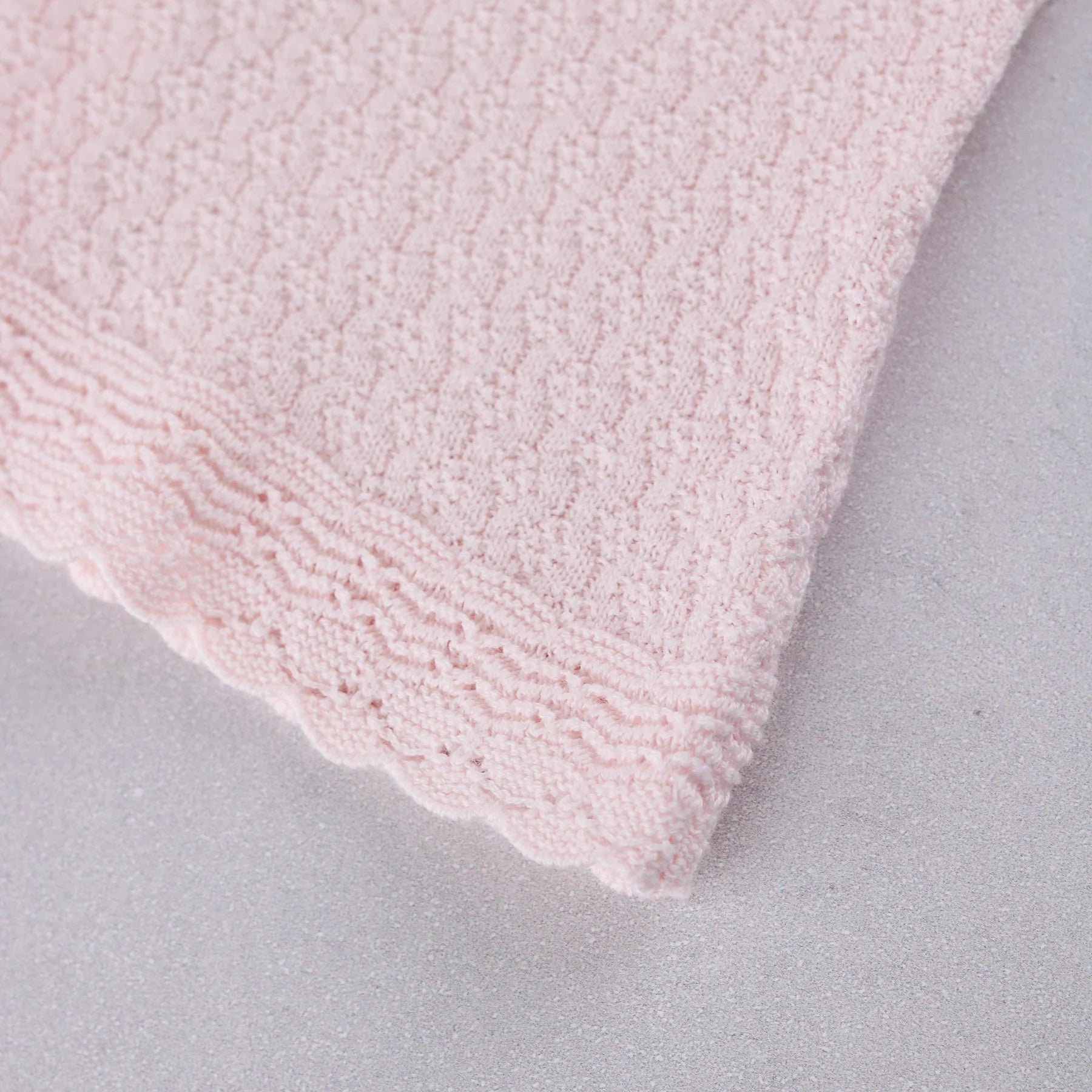 Close-up of the knitted cuff detail on the Emile et Rose Minny baby girls outfit set