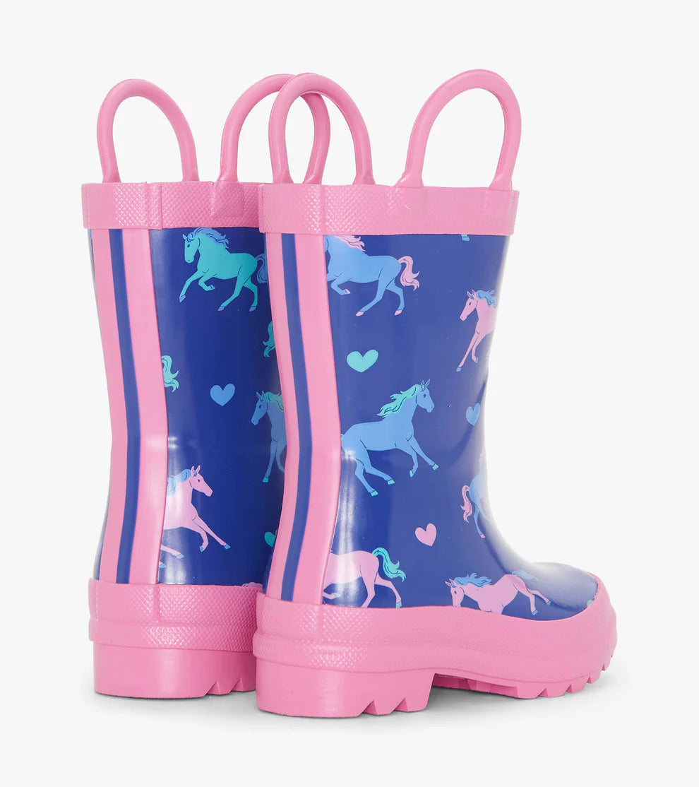 Back view of Hatley Hearts & Horses girls wellies with pink double stripe