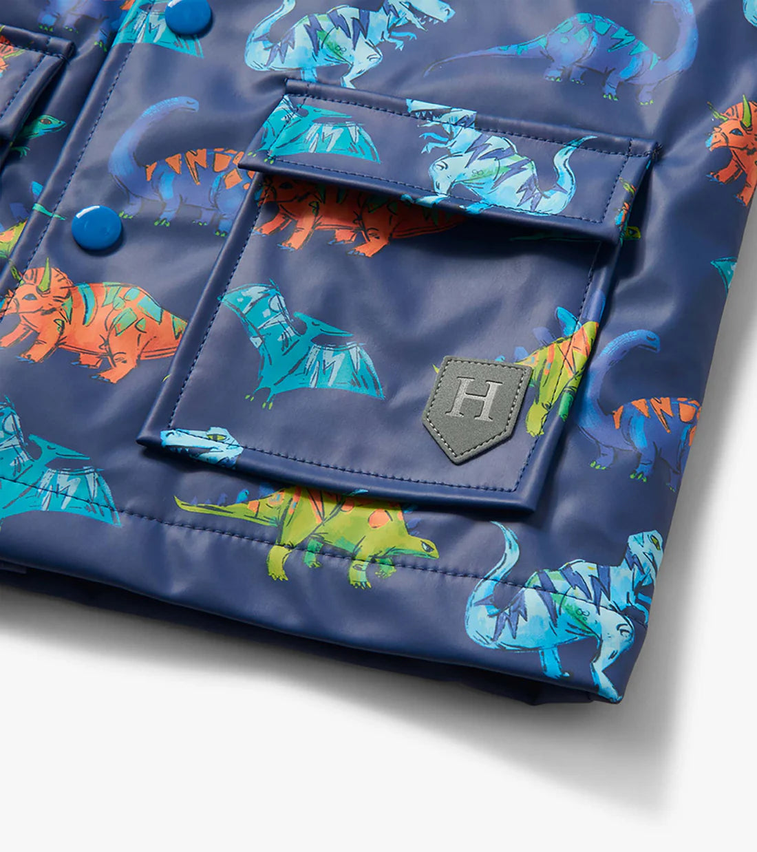 Hatley boys dinosaur raincoat pocket detail with flap