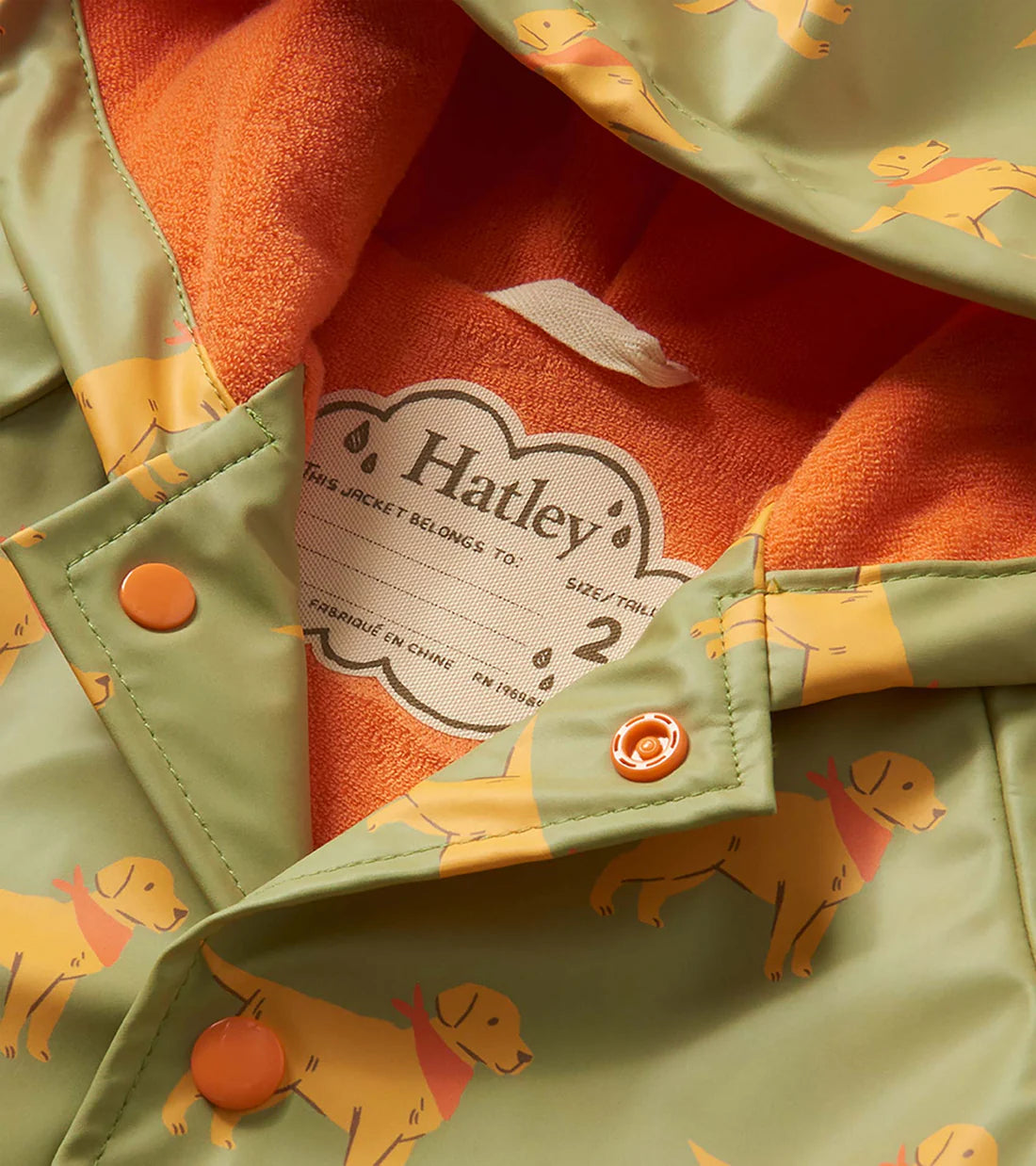 Close up Hatley dog raincoat lining orange soft terry interior