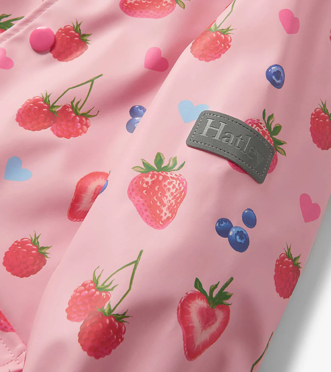 Hatley girls waterproof strawberry print rain coat fabric detail with logo badge