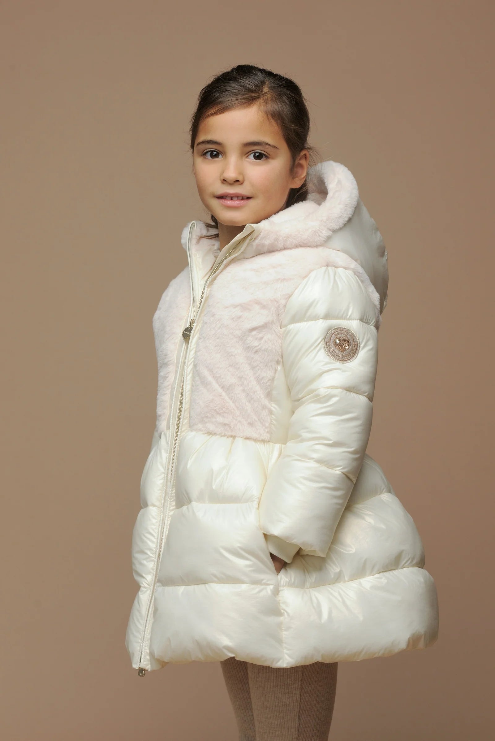 Chic girls winter white quilted puffer jacket – angled view with hood