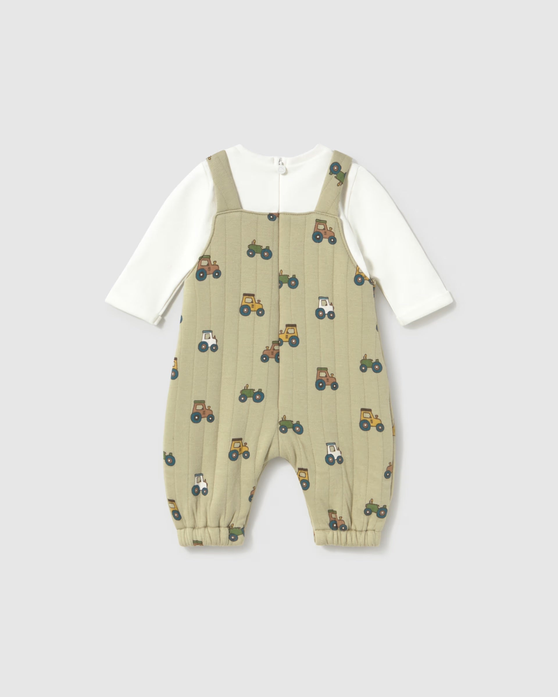 Rear view of Mayoral baby boys green tractor dungarees and cream long-sleeved top