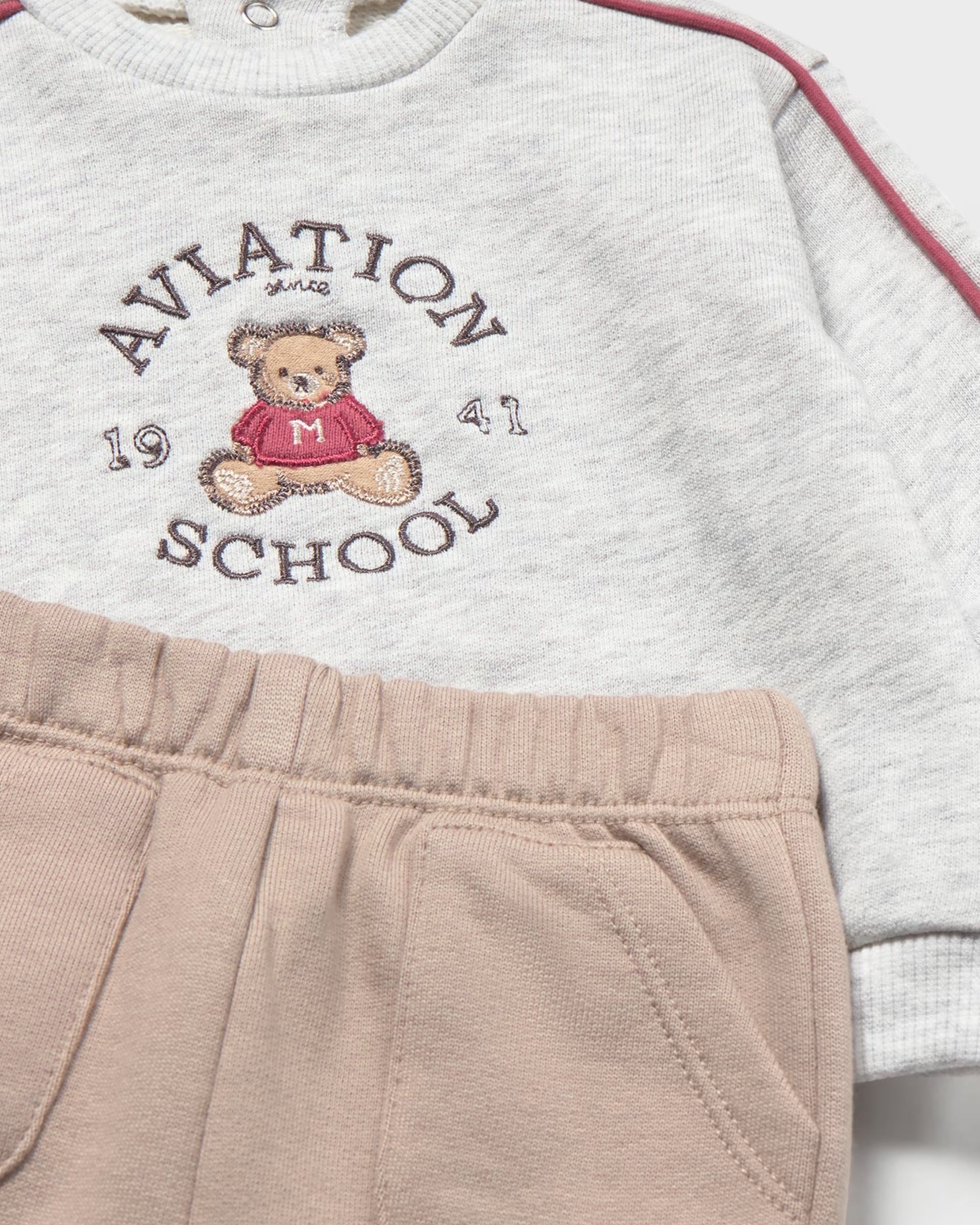 Close-up of Mayoral baby boys grey Aviation School teddy sweatshirt and elasticated taupe joggers
