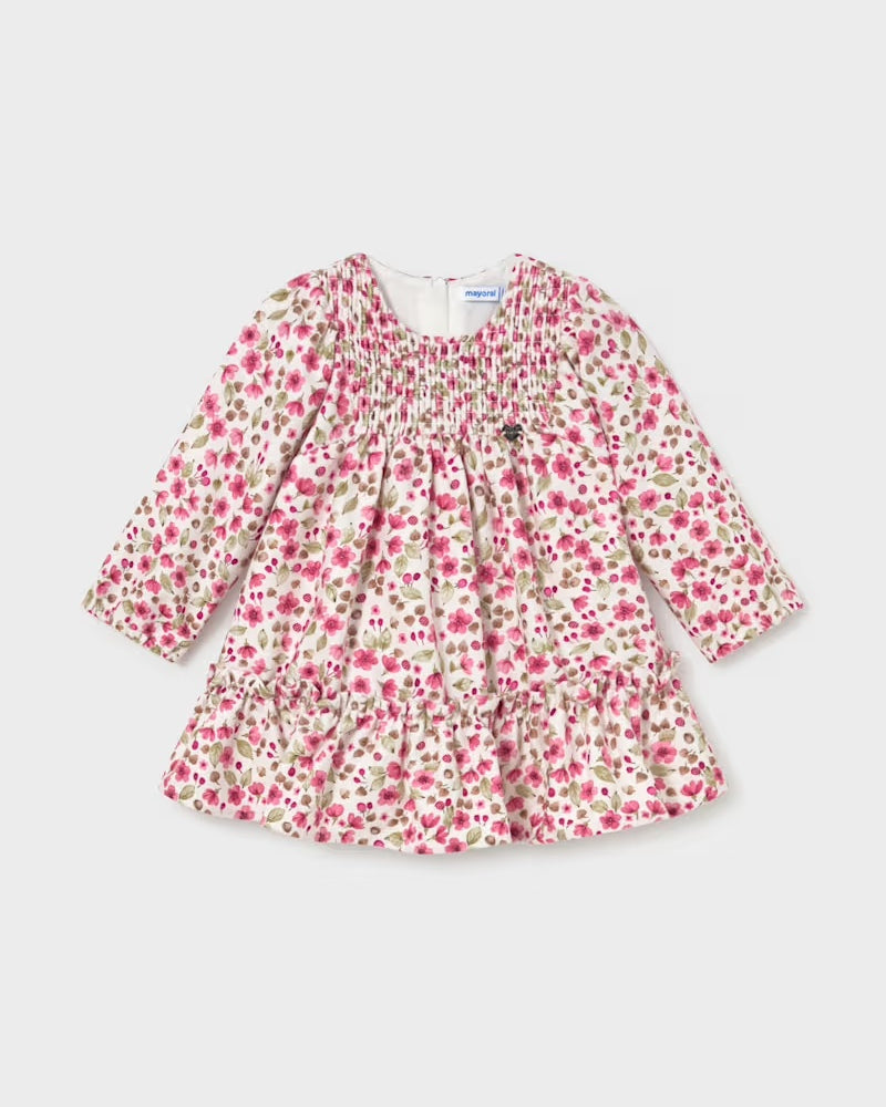 Mayoral baby girls pink floral velvet dress front view with smocked bodice and ruffle hem