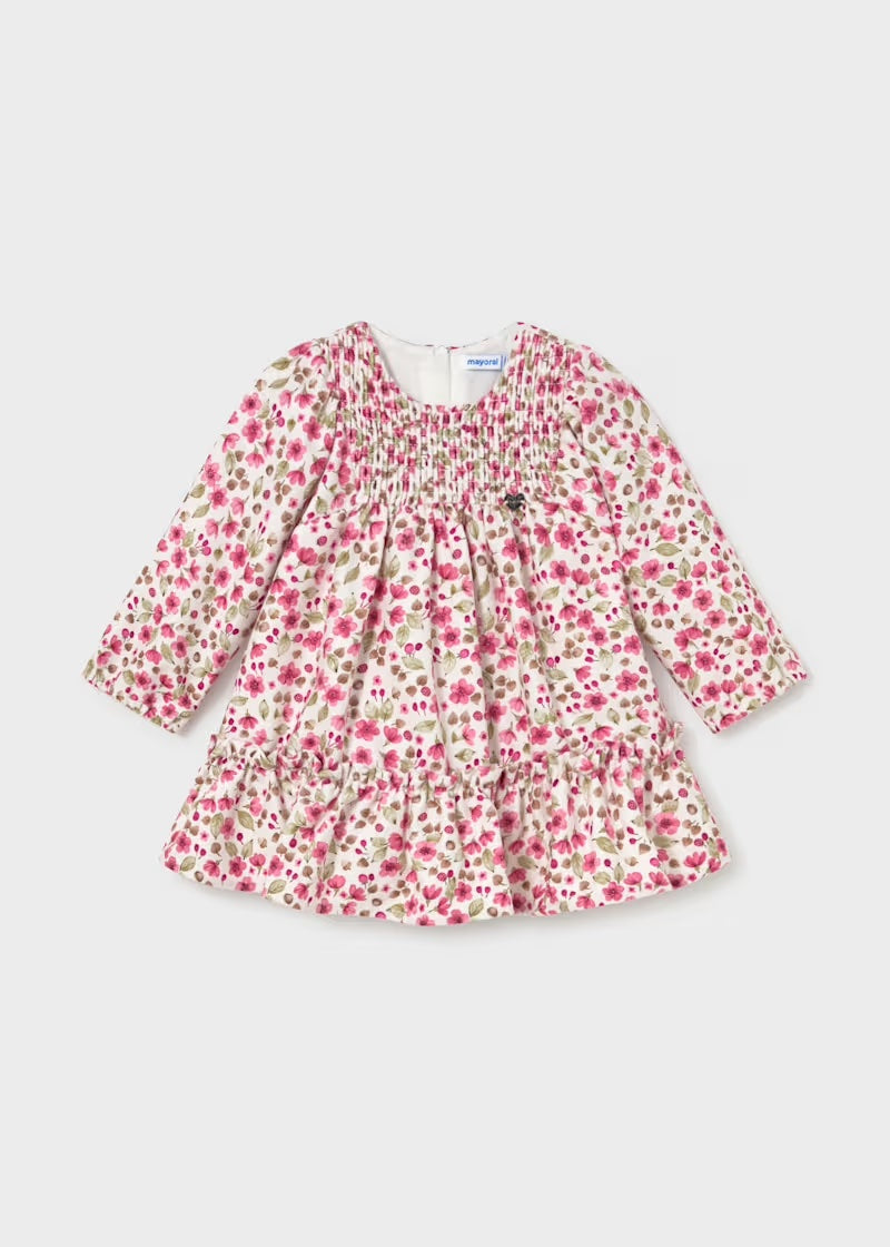 Mayoral baby girls pink floral velvet dress front view with smocked bodice and ruffle hem