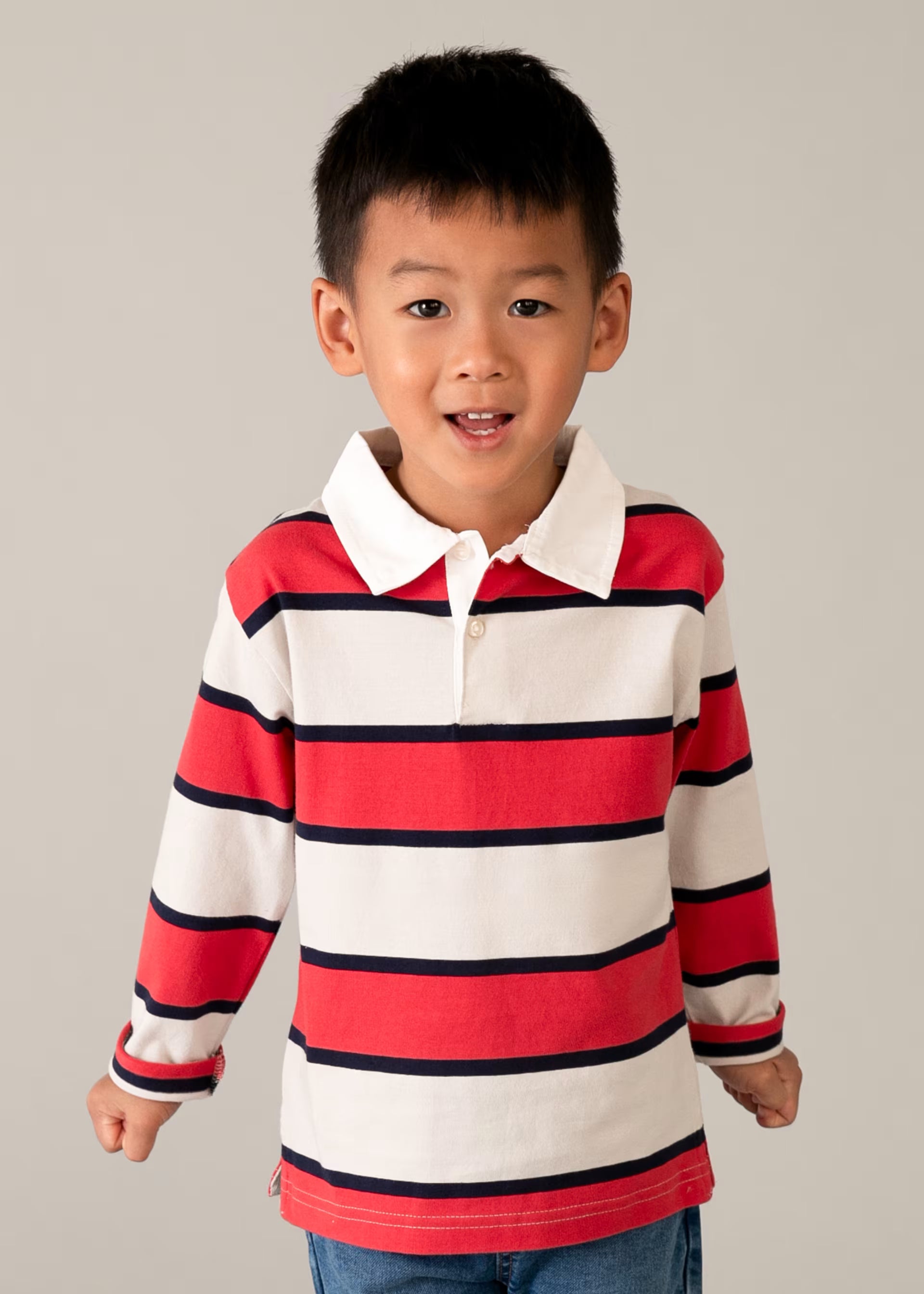 Mayoral boys red and navy striped polo top worn on boy aged 7 years