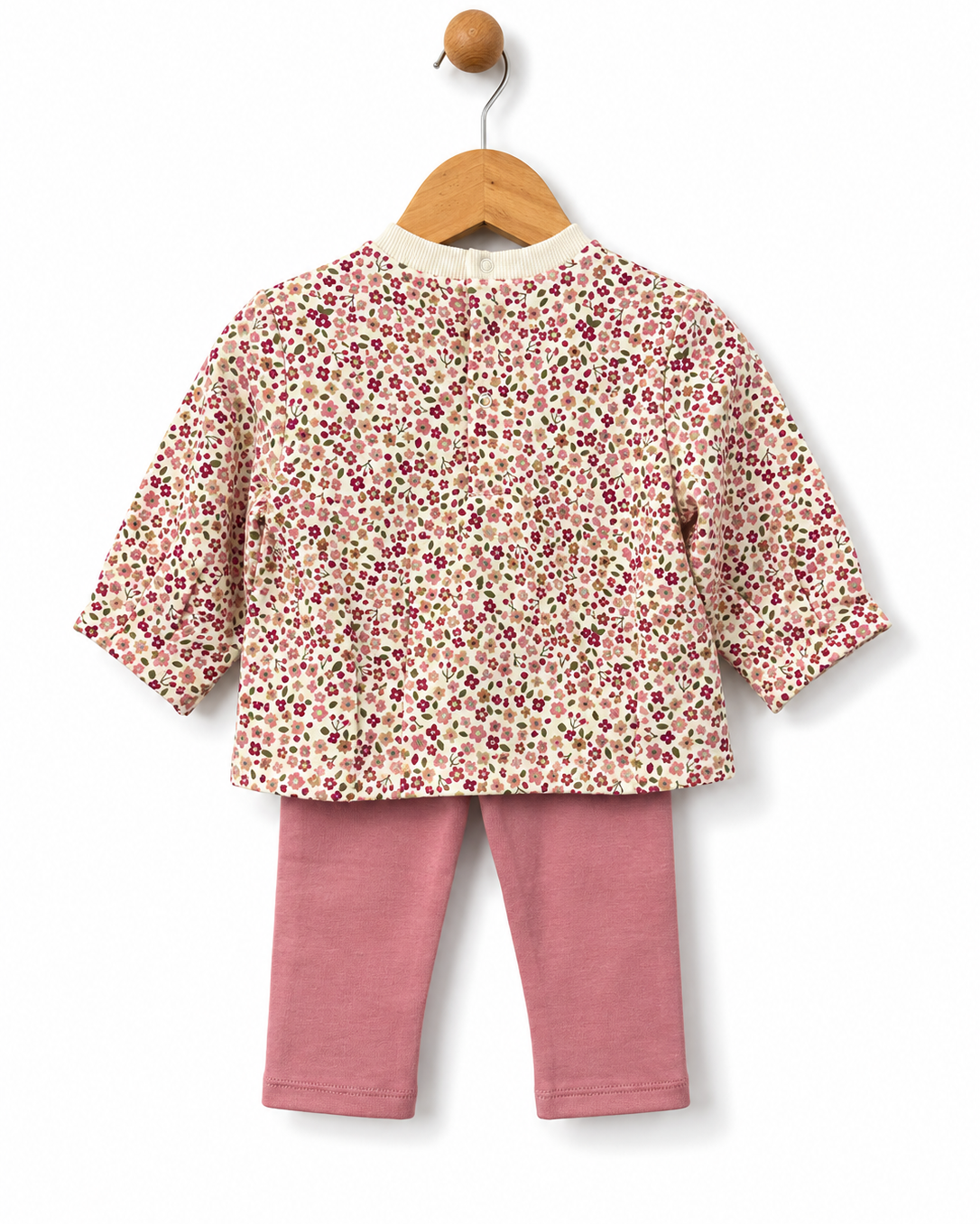 Rear view of Mayoral baby girls pink sweatshirt and floral leggings showing the back popper fastening