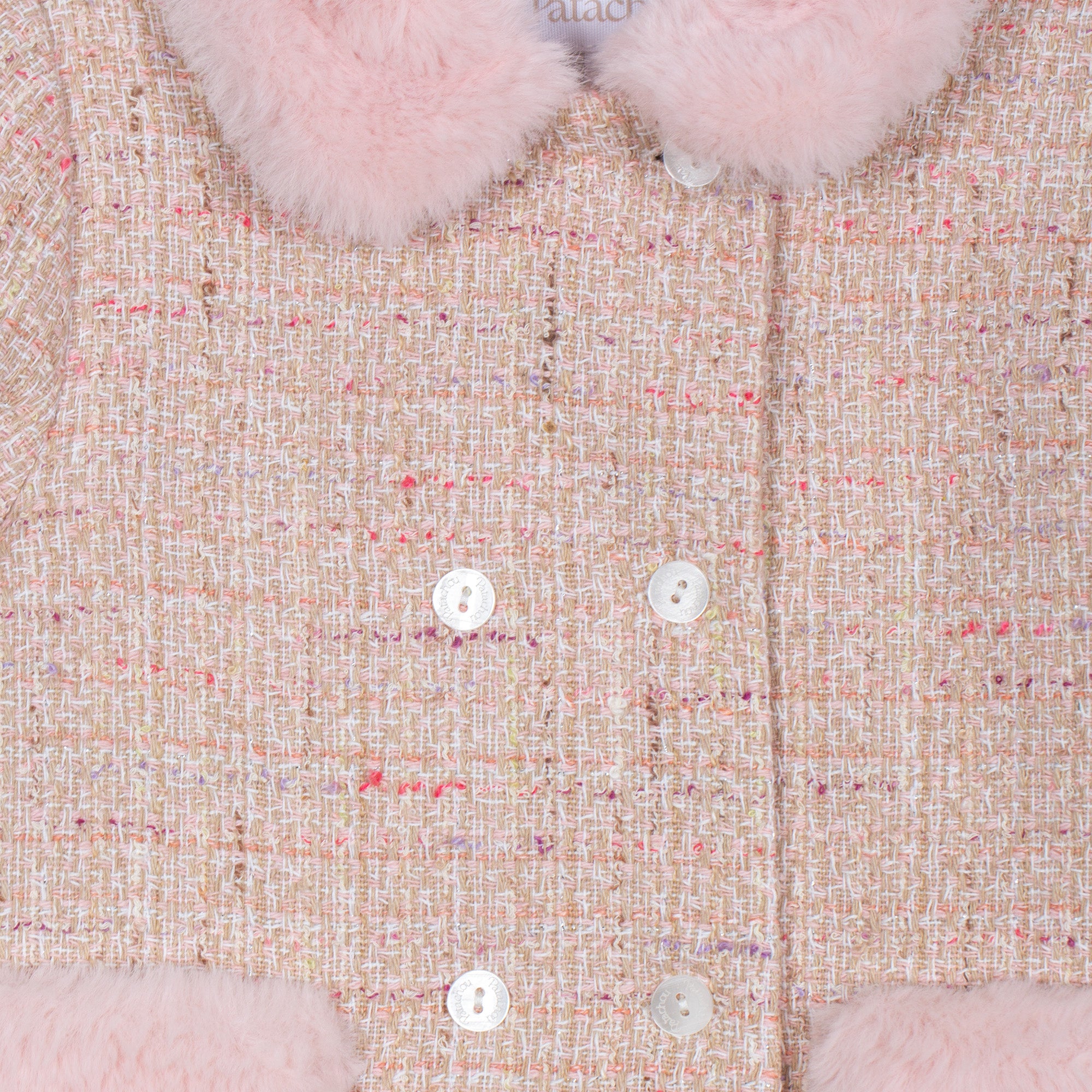 Close-up of Patachou pink tweed girls coat with faux fur details