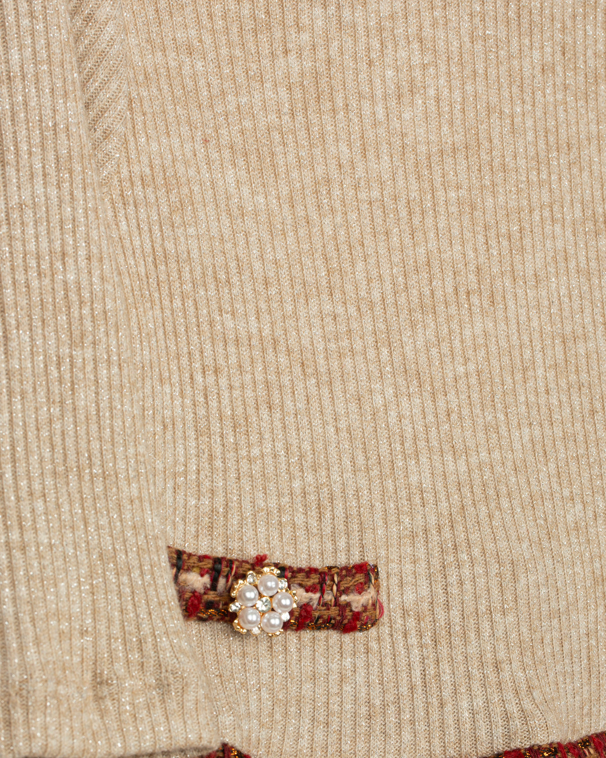 Close-up of Patachou tweed dress pocket with jewel button detail