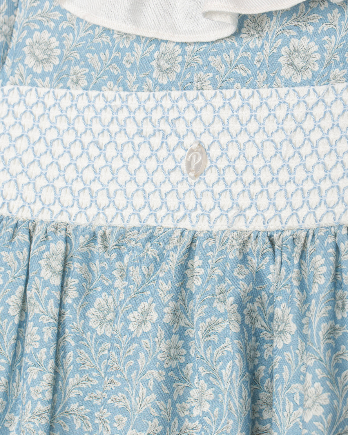 Close-up of Patachou blue garden dress smocked chest panel