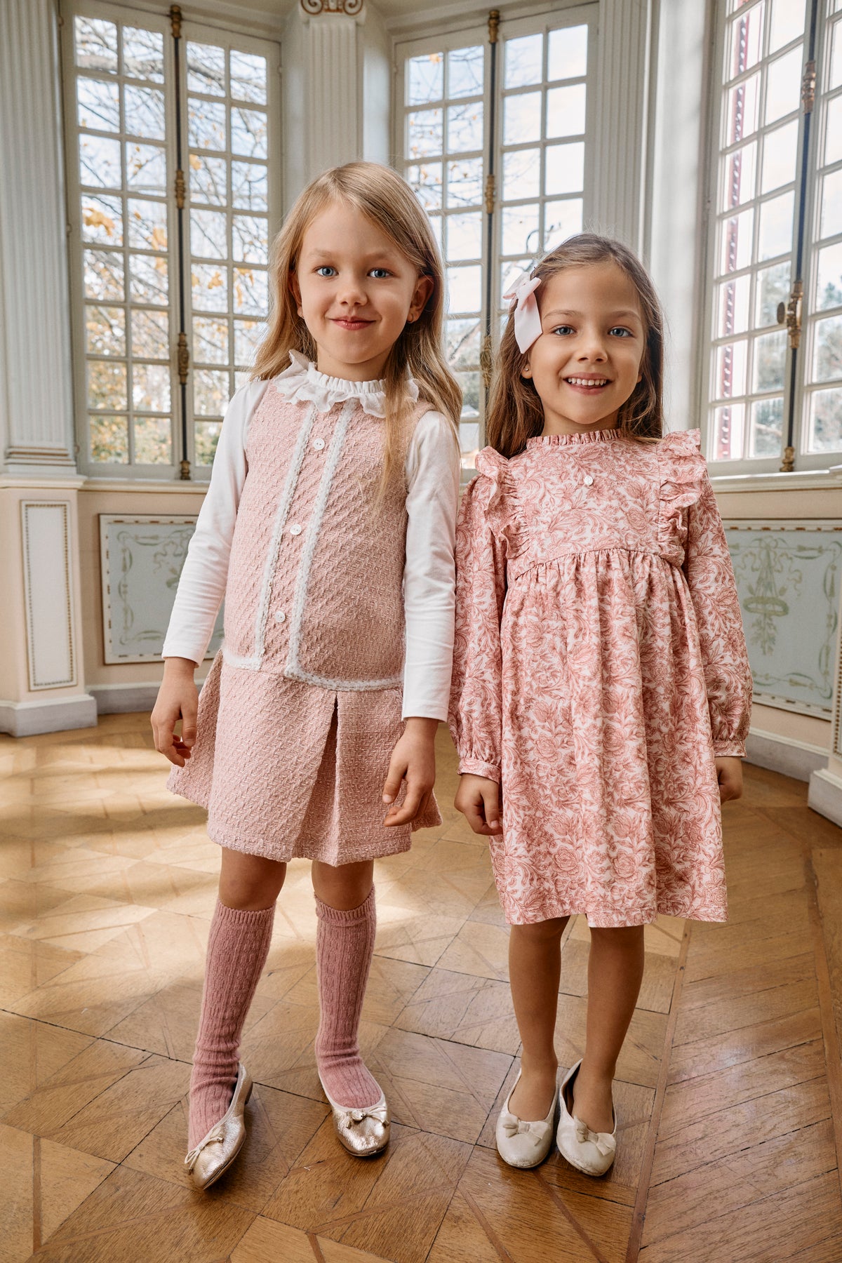 Girls wearing Patachou Liberty Rose pink floral dress and matching separates