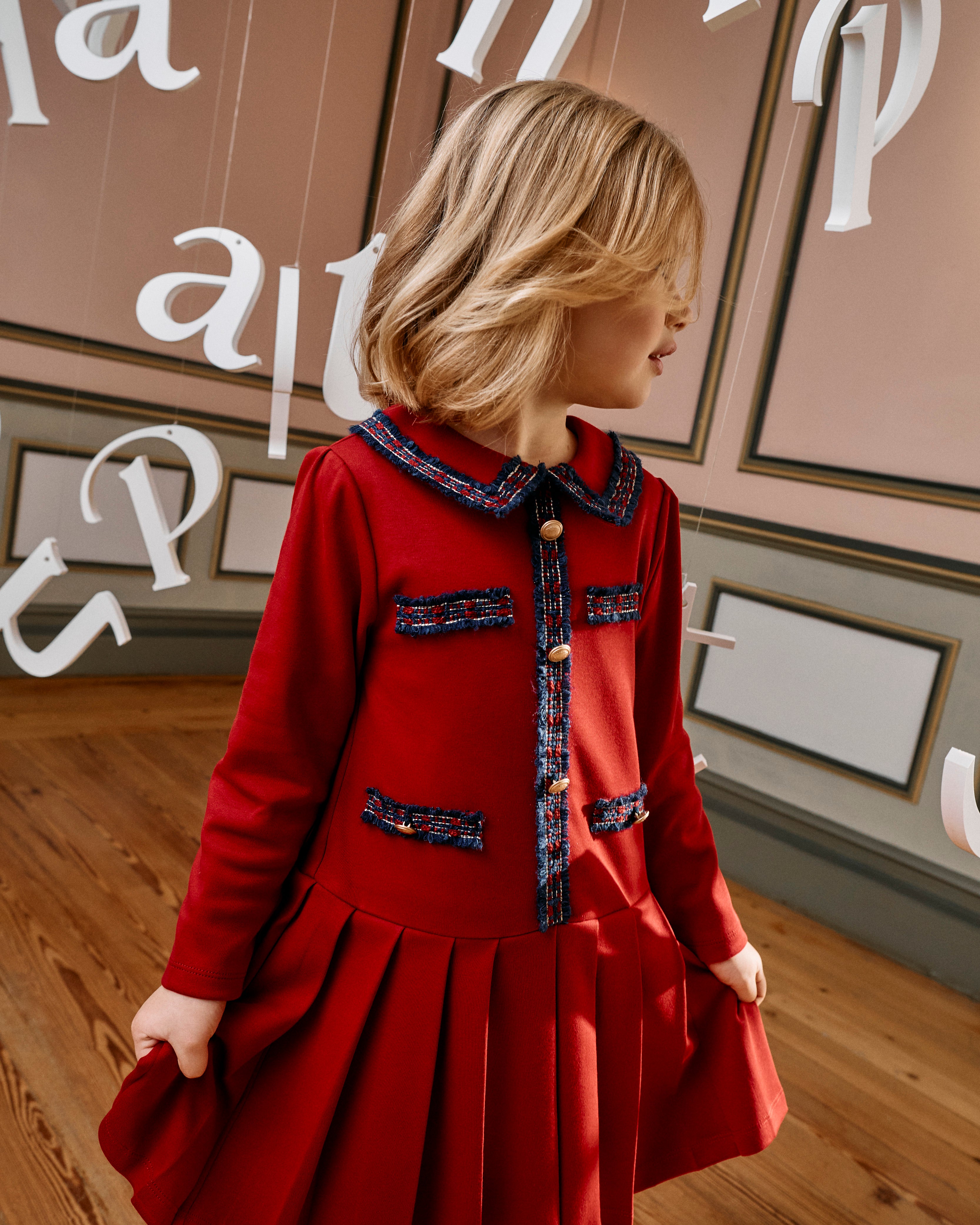 Little Girl wearing Patachou red knit Christmas occasion dress