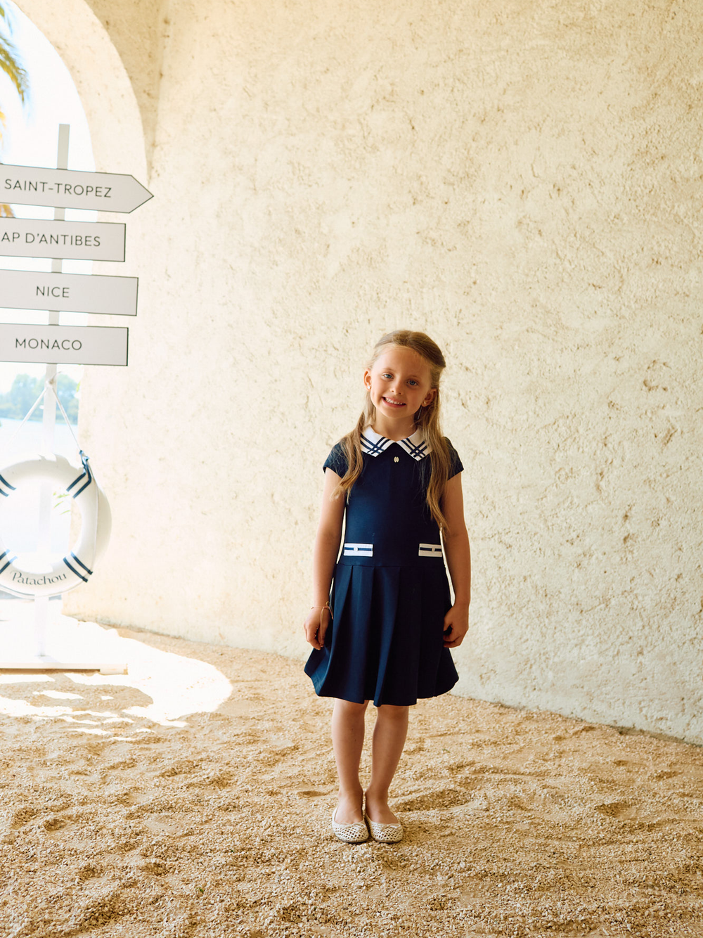 Patachou girls navy occasion dress worn outdoor