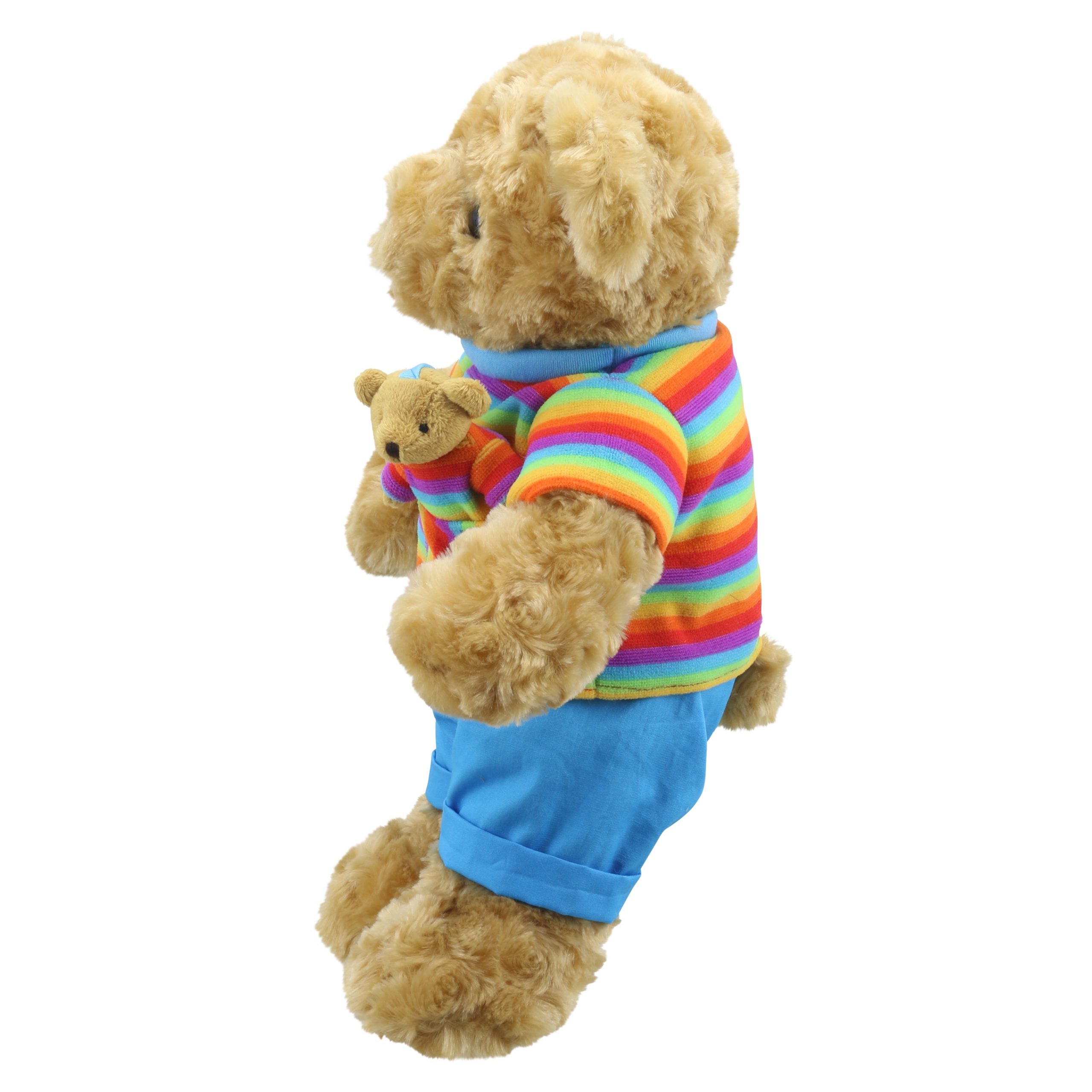 The Puppet Company Rainbow Bear children’s soft toy shown from the side