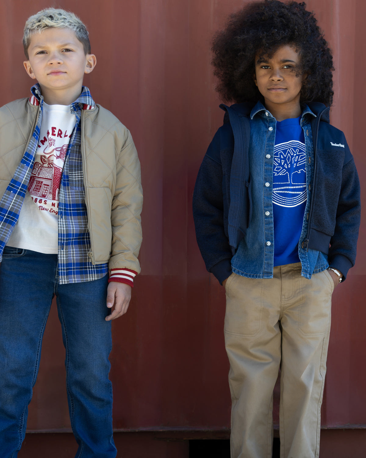 Boy wearing Timberland blue checked shirt layered with casual jacket and jeans