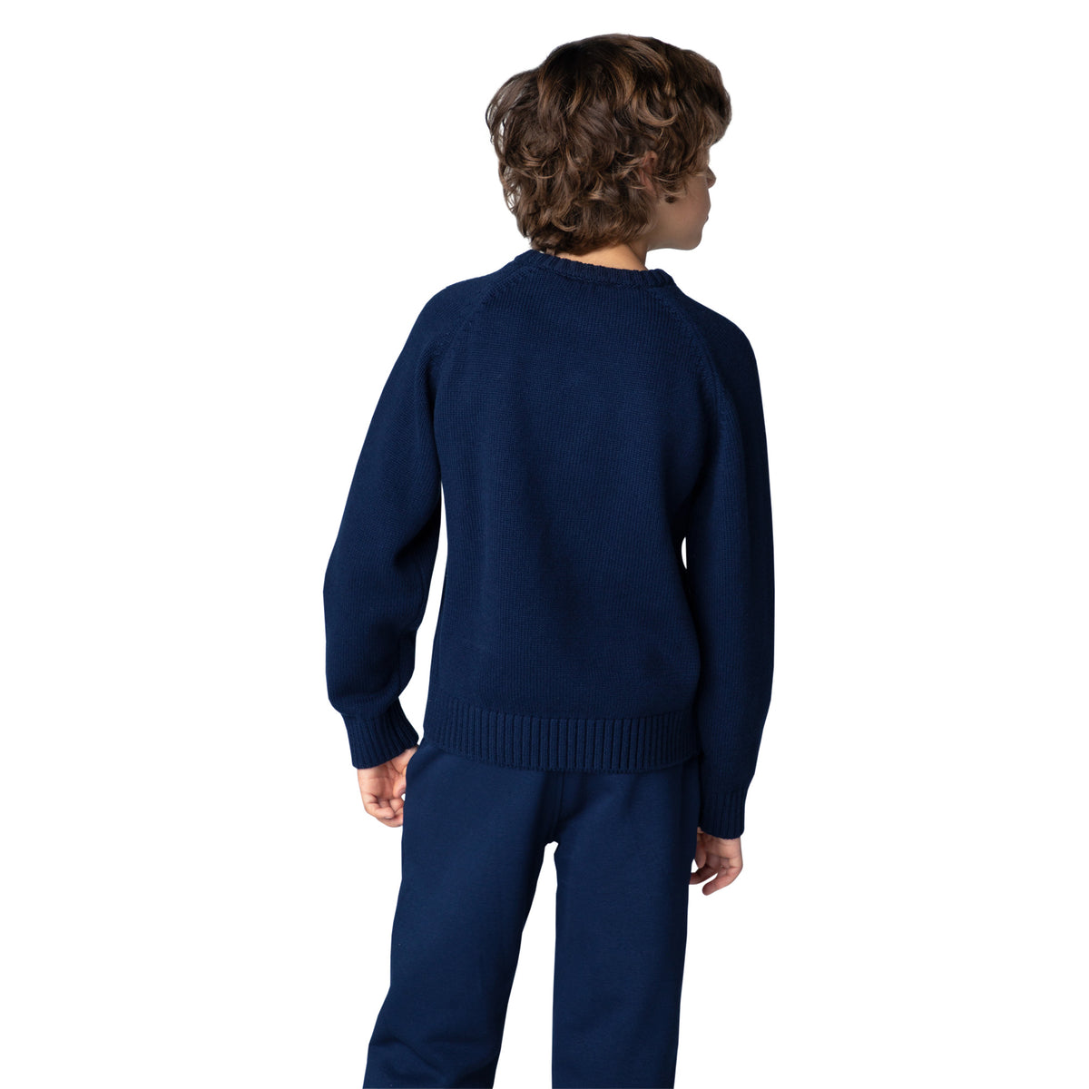 Close-up of Timberland boys navy blue crew neck knitted jumper