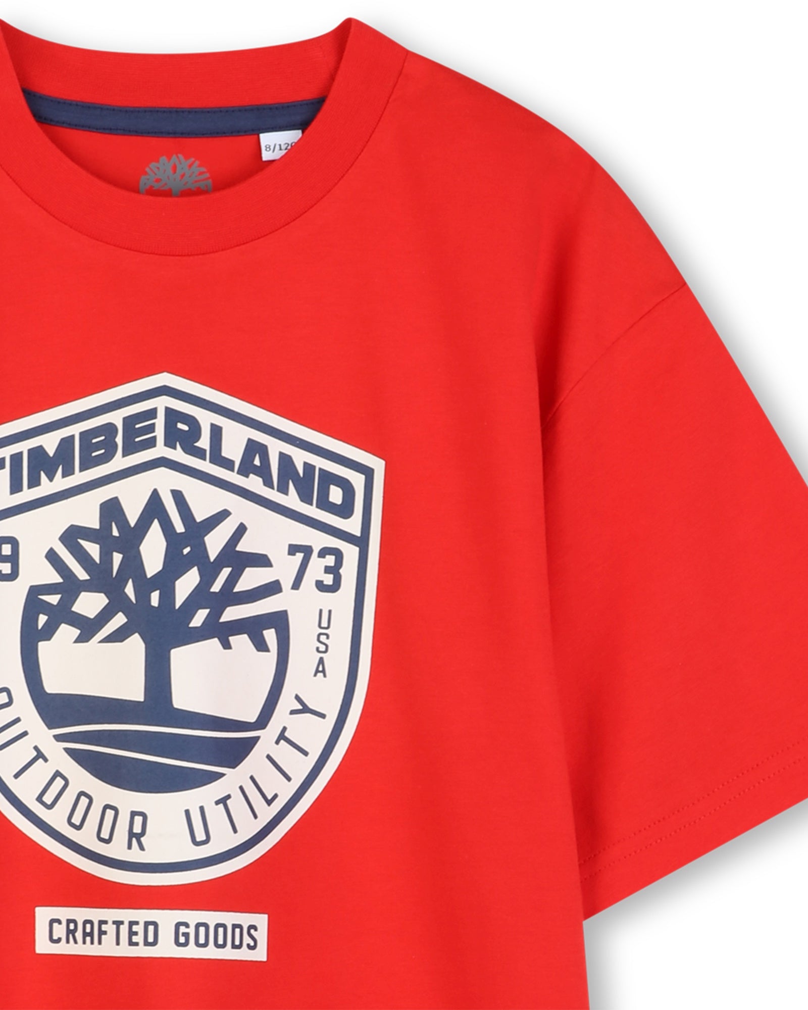 Timberland boys red logo T-shirt close-up with outdoor utility motif