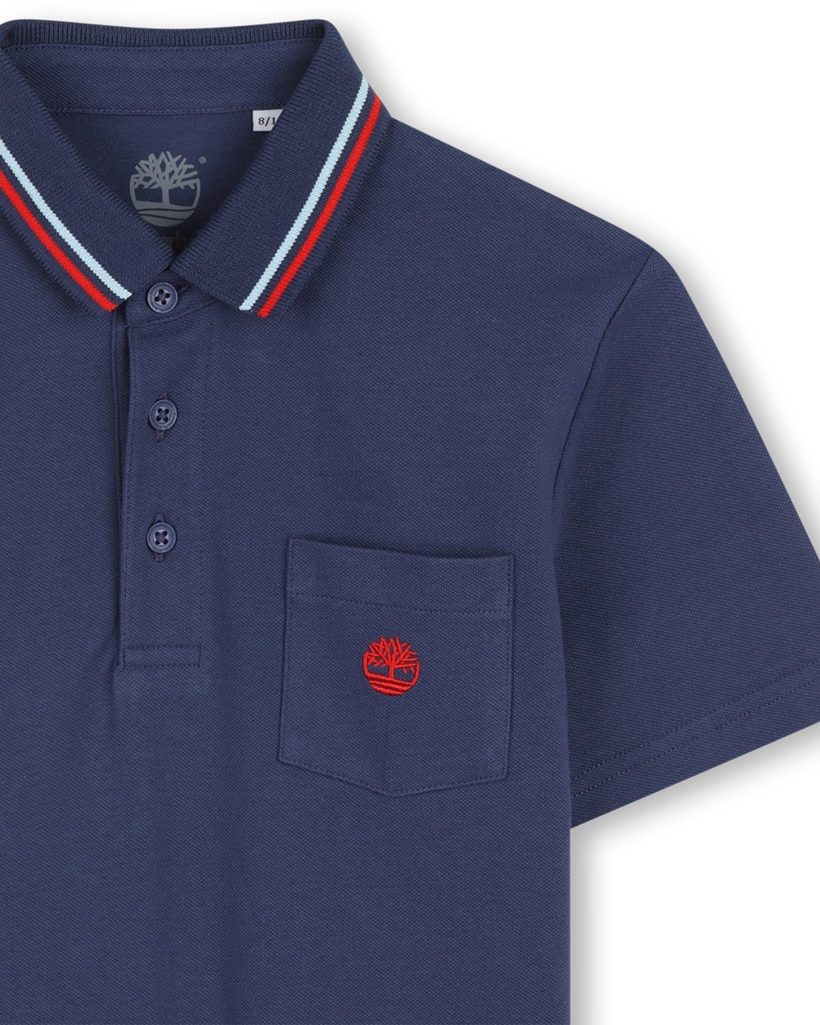 Timberland boys smart navy polo shirt close-up with chest pocket logo