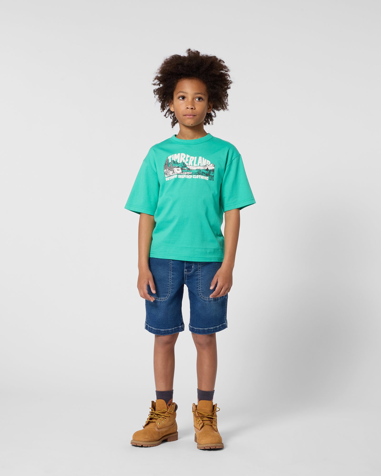 Timberland boys denim shorts styled with green Timberland T-shirt