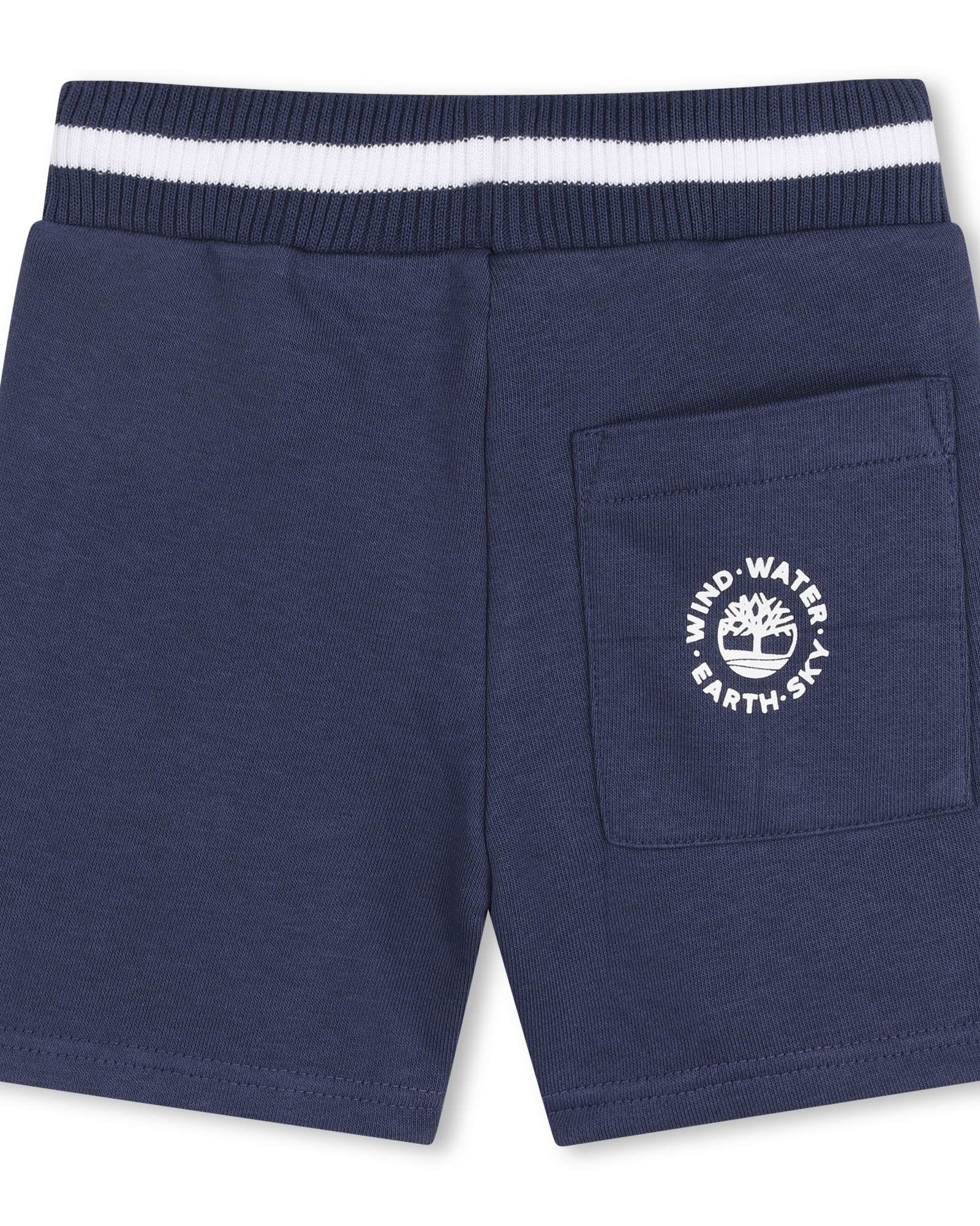 Timberland boys striped polo shirt close-up with chest pocket logo