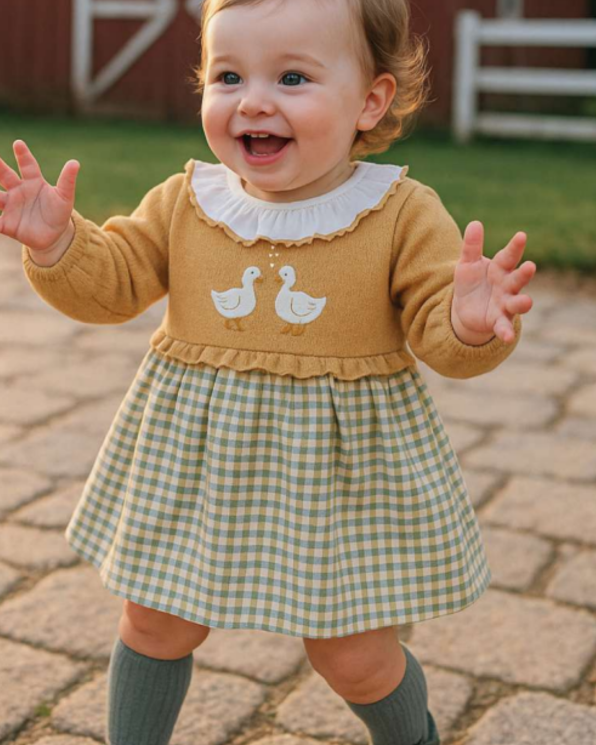 Tutto Piccolo baby girls mustard duck dress with check skirt and green tights