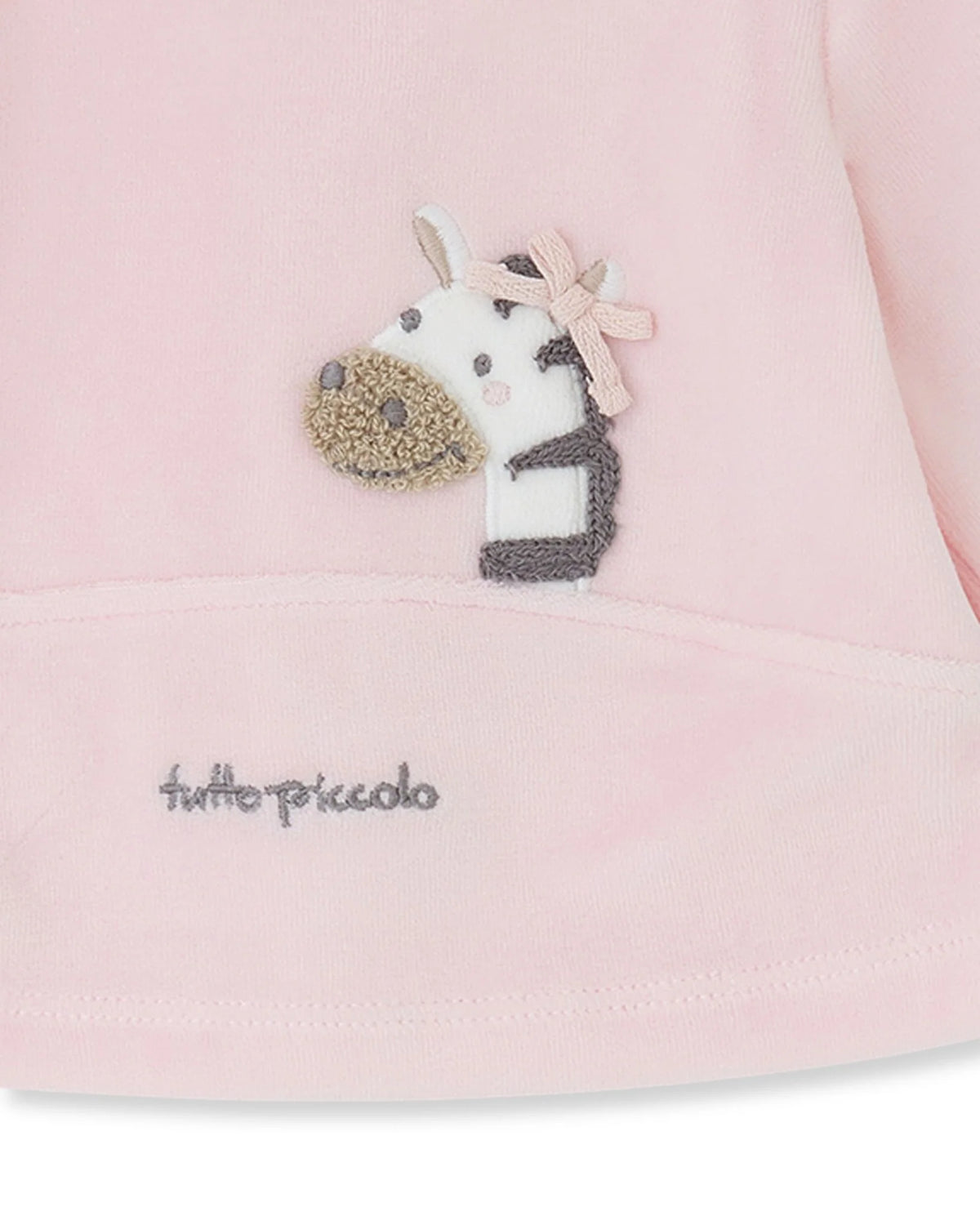 Close-up of embroidered zebra on Tutto Piccolo petal pink baby top