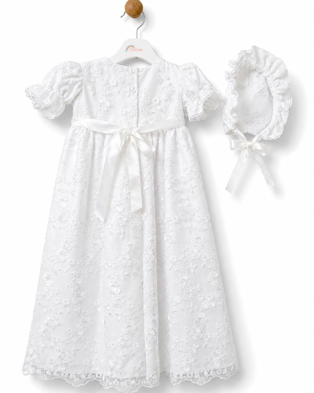 Rear view of the Visara white christening gown with satin sash bow and matching bonnet