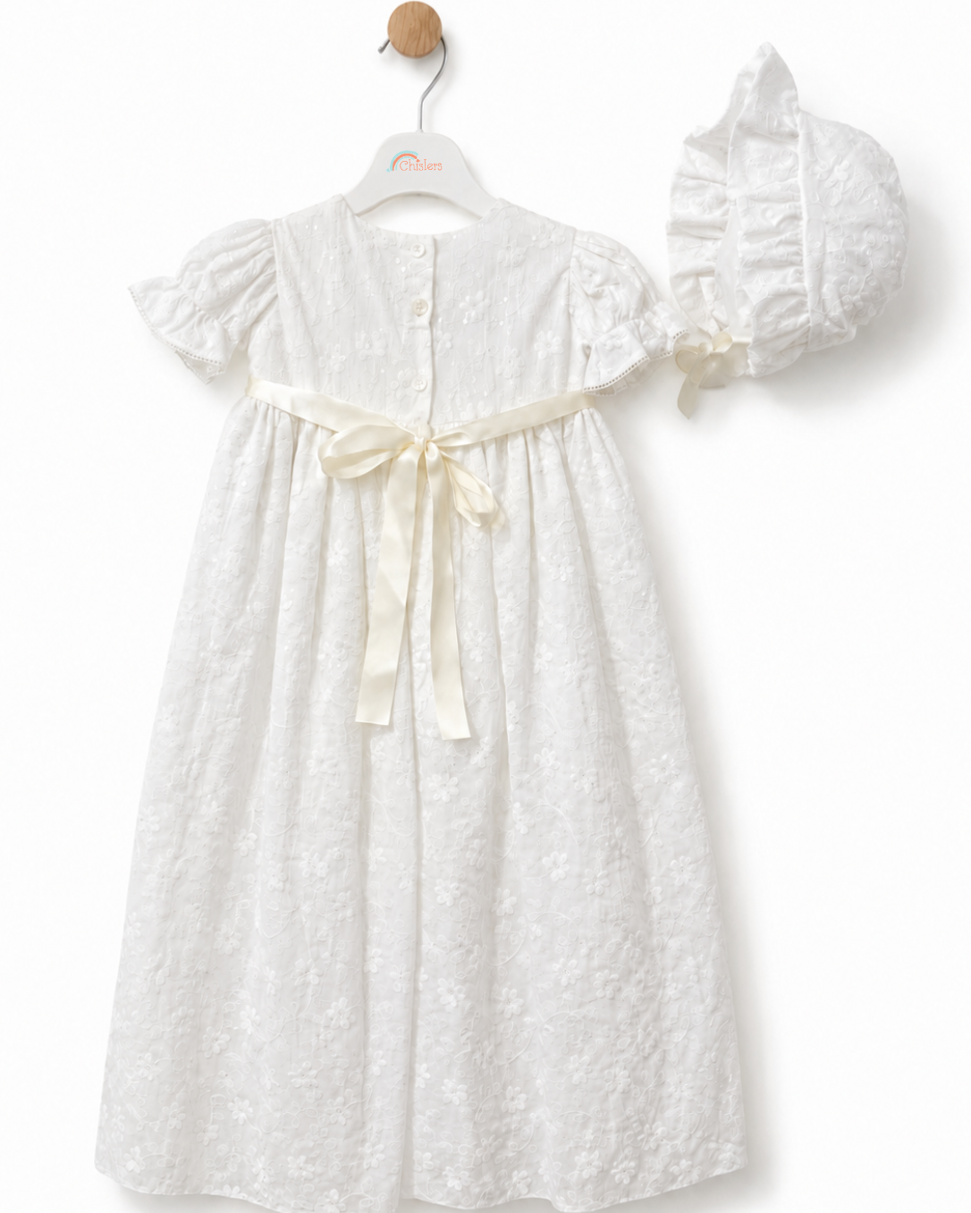 Rear view of Visara baby girls pale ivory floral christening gown with satin sash and matching bonnet
