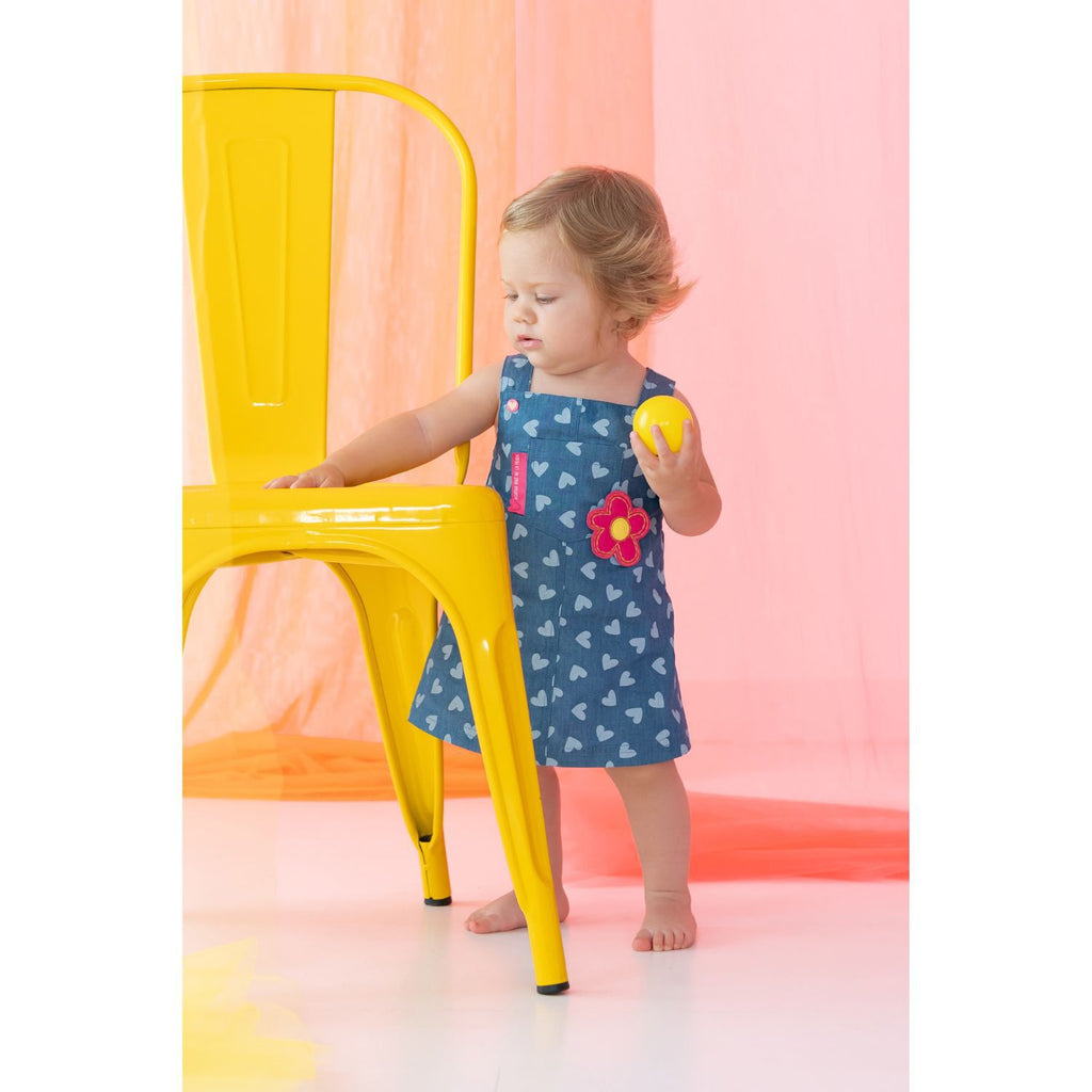 Lightweight denim girls pinafore dress with white heart pattern and pocket flower patch – Agatha Ruiz de la Pra