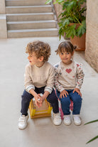 Little girls everyday outfit with heart top and jeans 