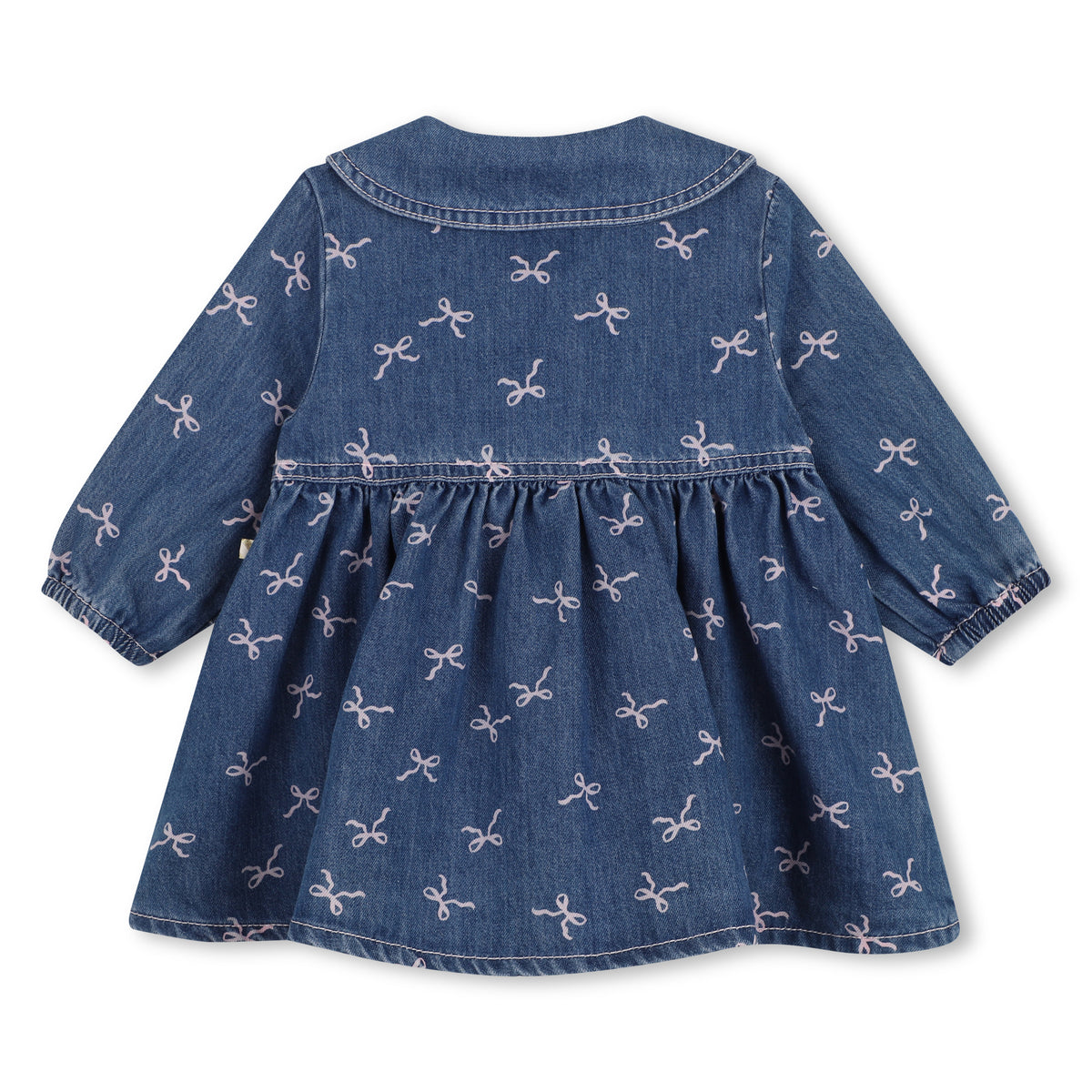 Back view of Billieblush girls blue denim dress with all-over pink bows and gathered skirt