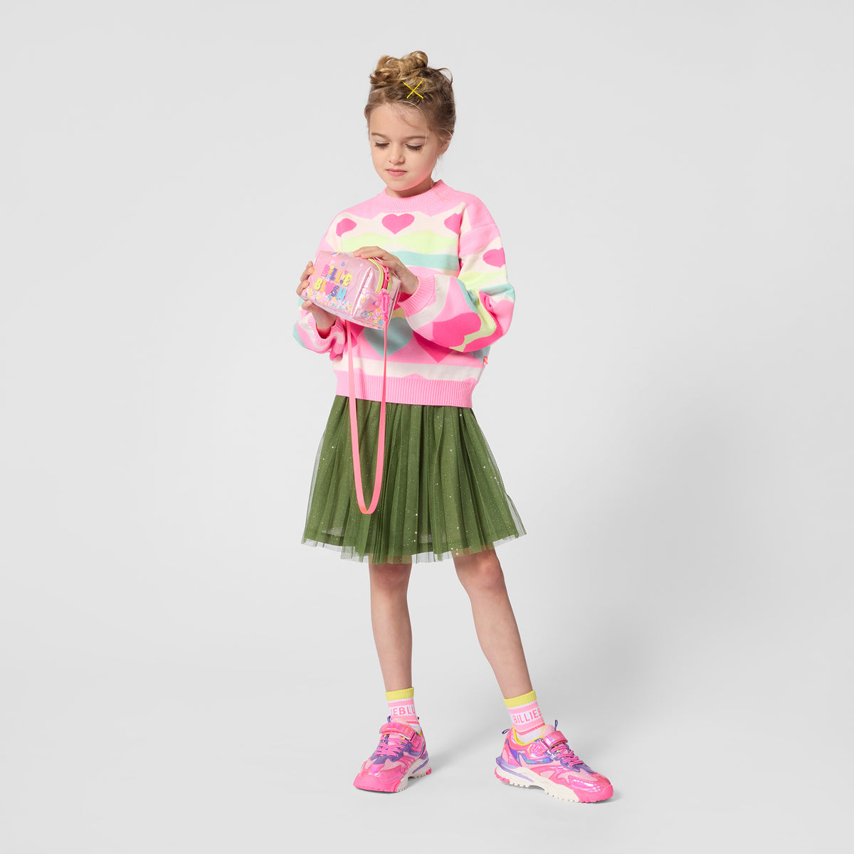 Billieblush girls green tulle skirt styled with colourful pink sweatshirt and trainers