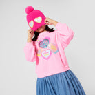 Billieblush girls sweatshirt-style dress with blue skirt styled with pink hat