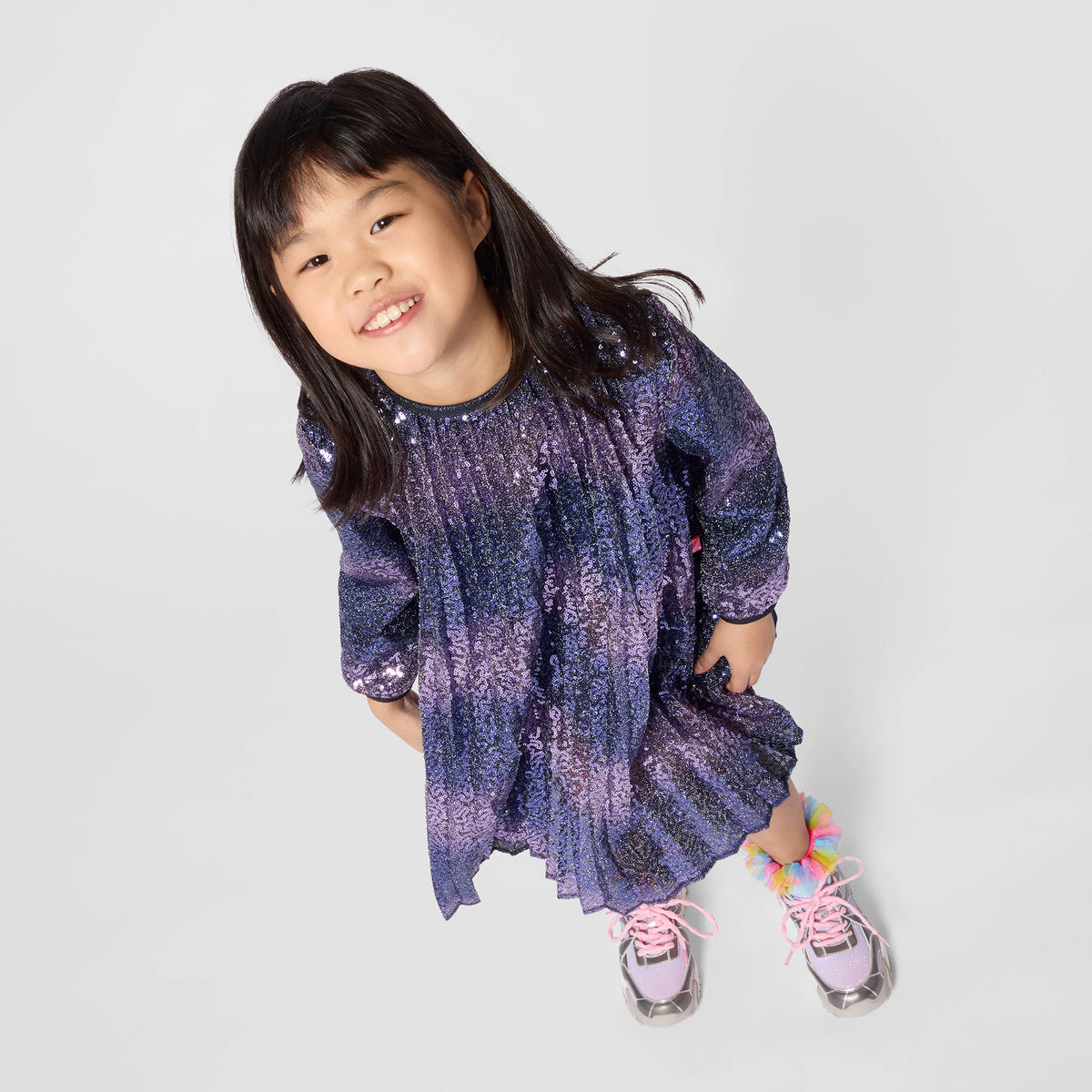 Billieblush girls pastel trainers styled with a purple dress