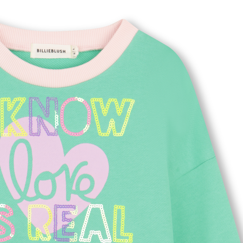 Billieblush girls green sweatshirt close up of slogan detail.